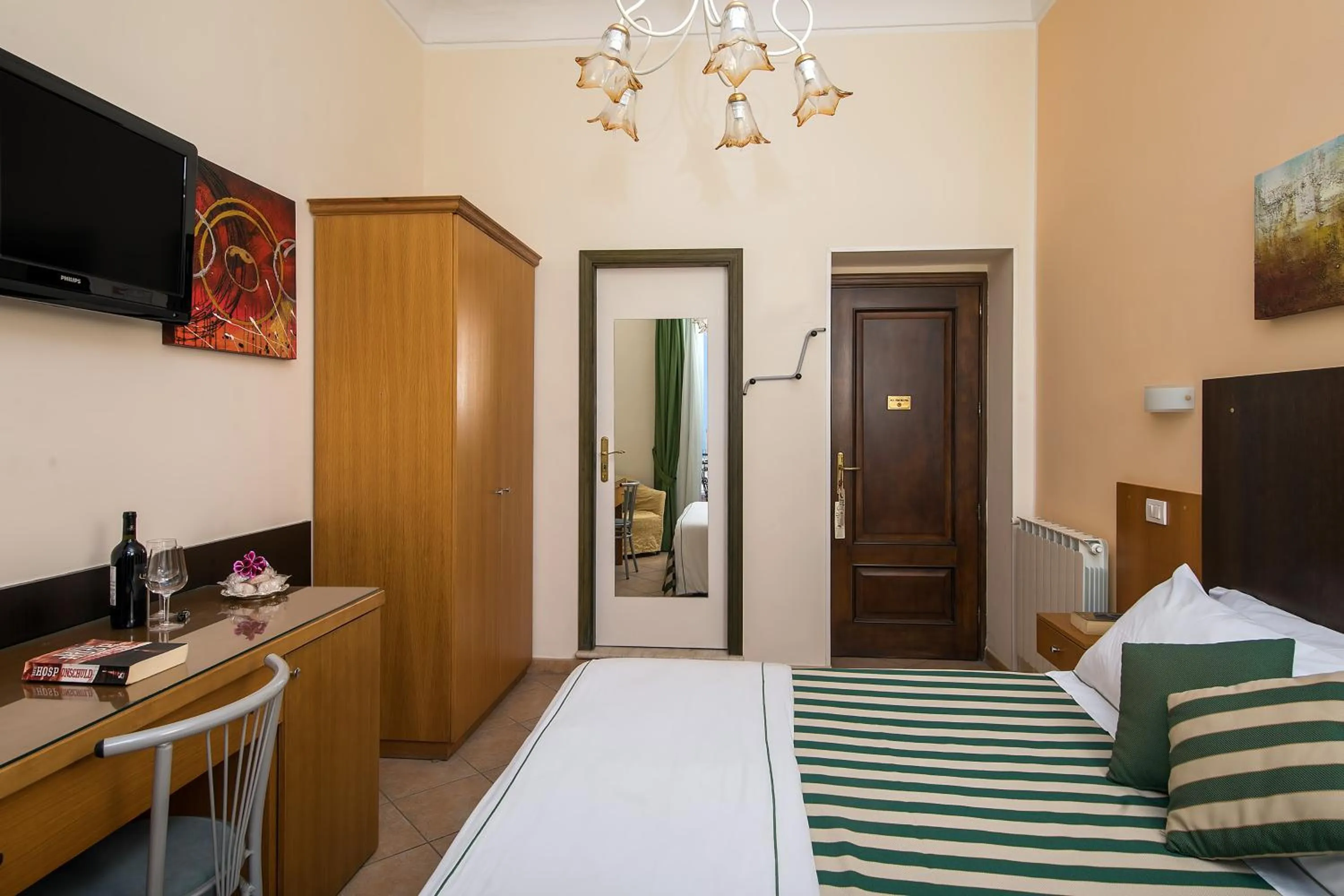 Bed in Hotel "La Pensione Svizzera"