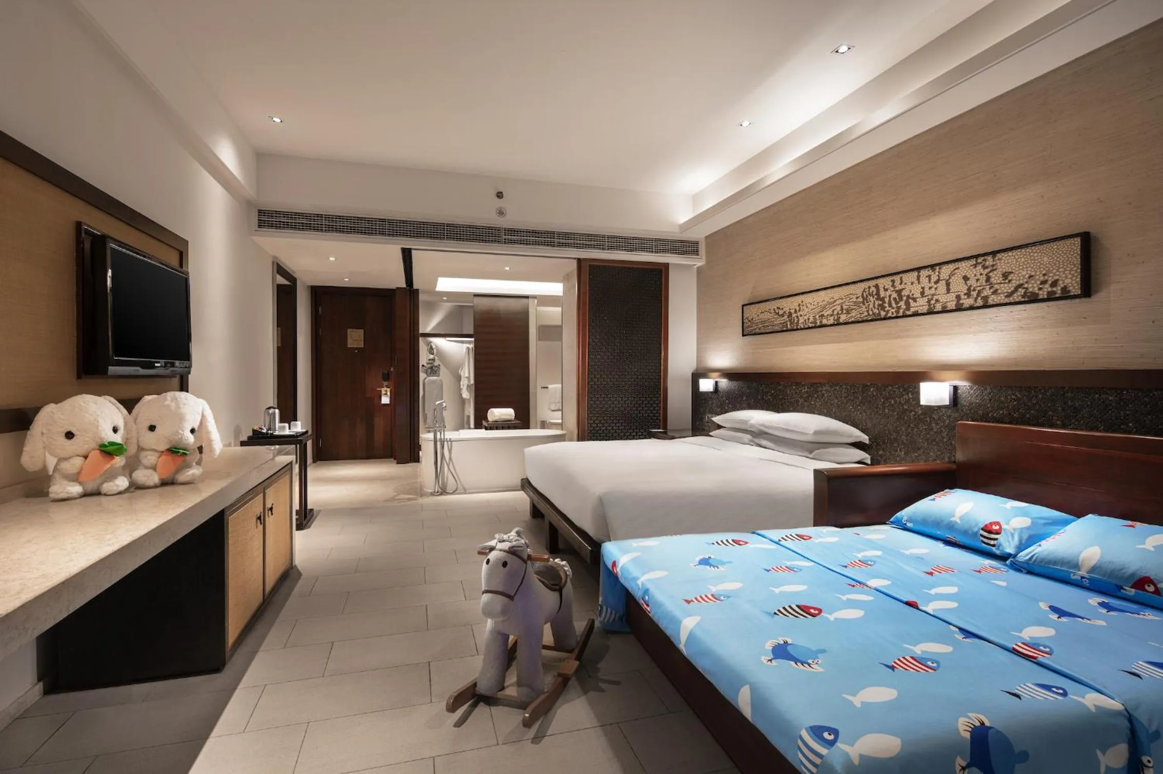 Photo of the whole room, Bed in Wanda Realm Resort Sanya Haitang Bay