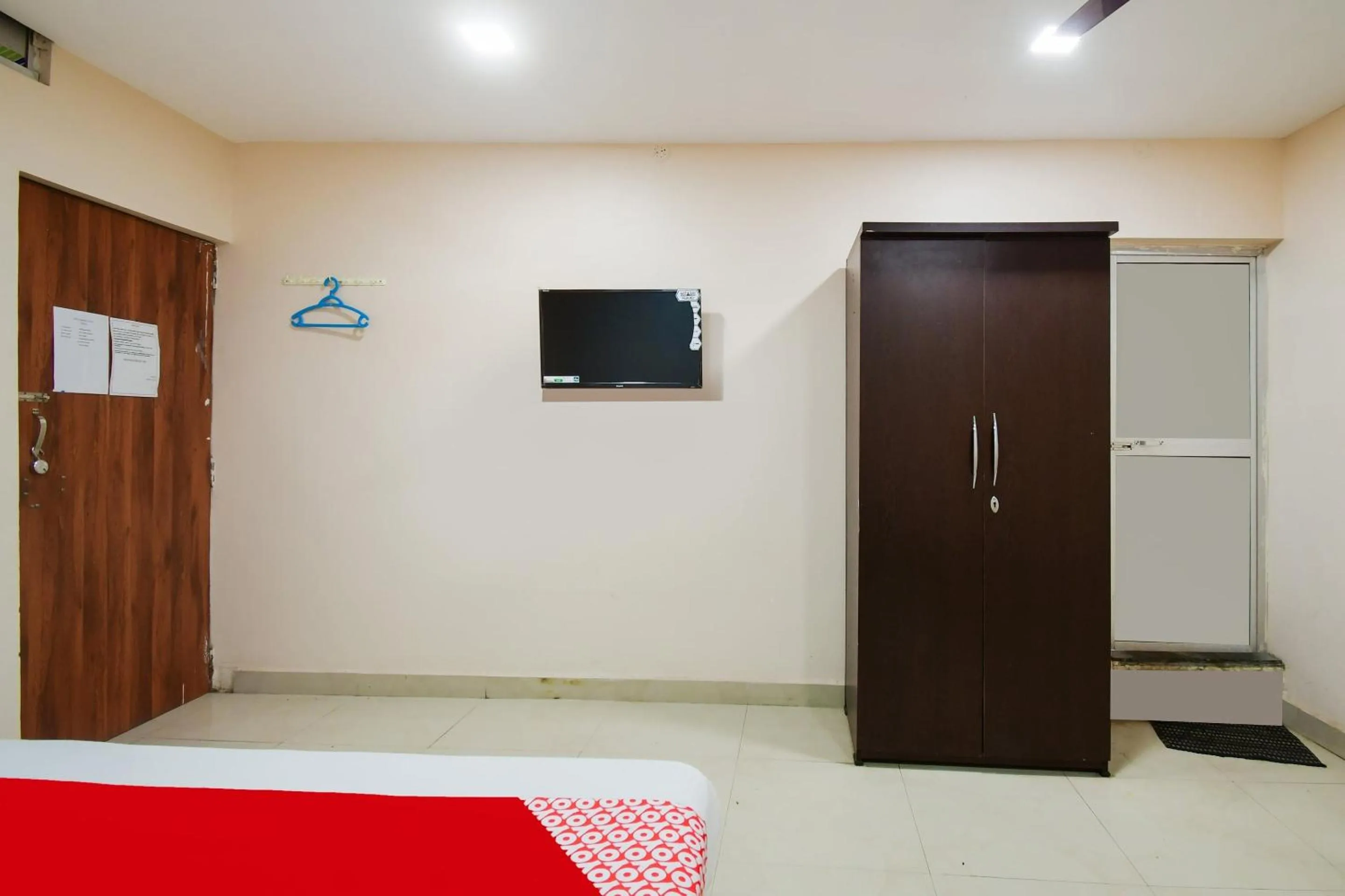 Bedroom in Hotel O Harihar Premium