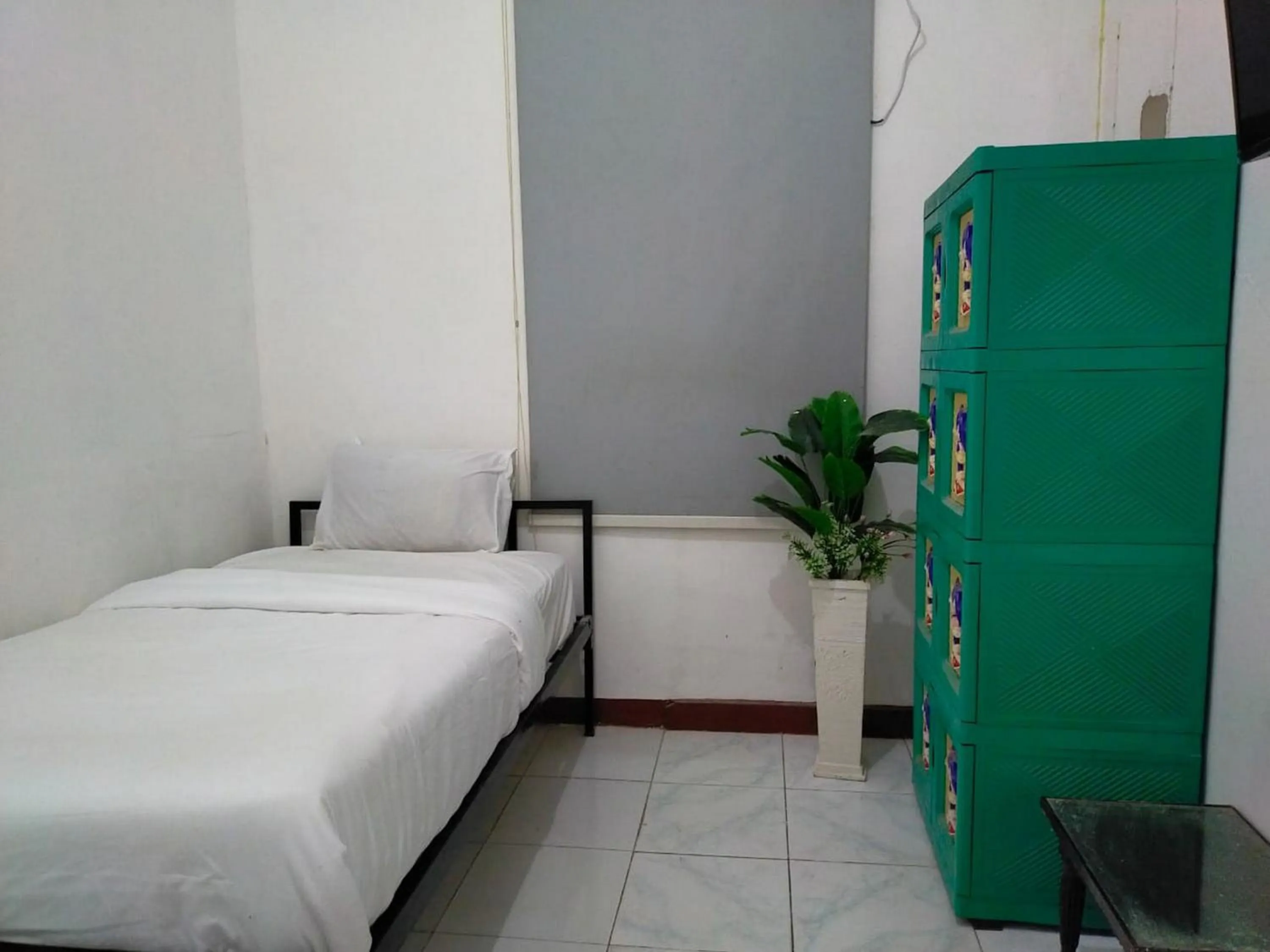 Bed in Ombai Guest House 27 Syariah Mitra RedDoorz