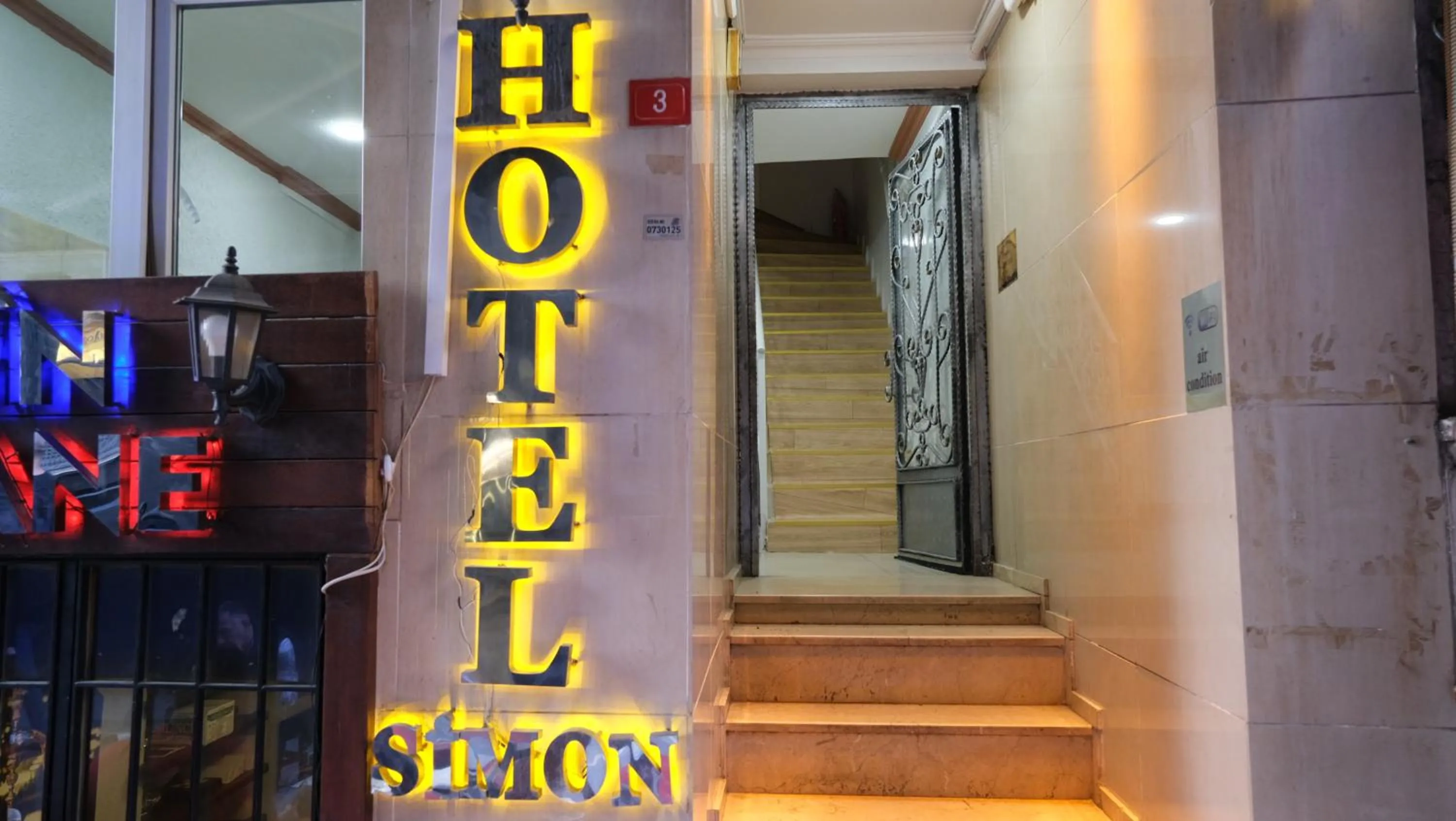 Property logo or sign in Simon Hotel