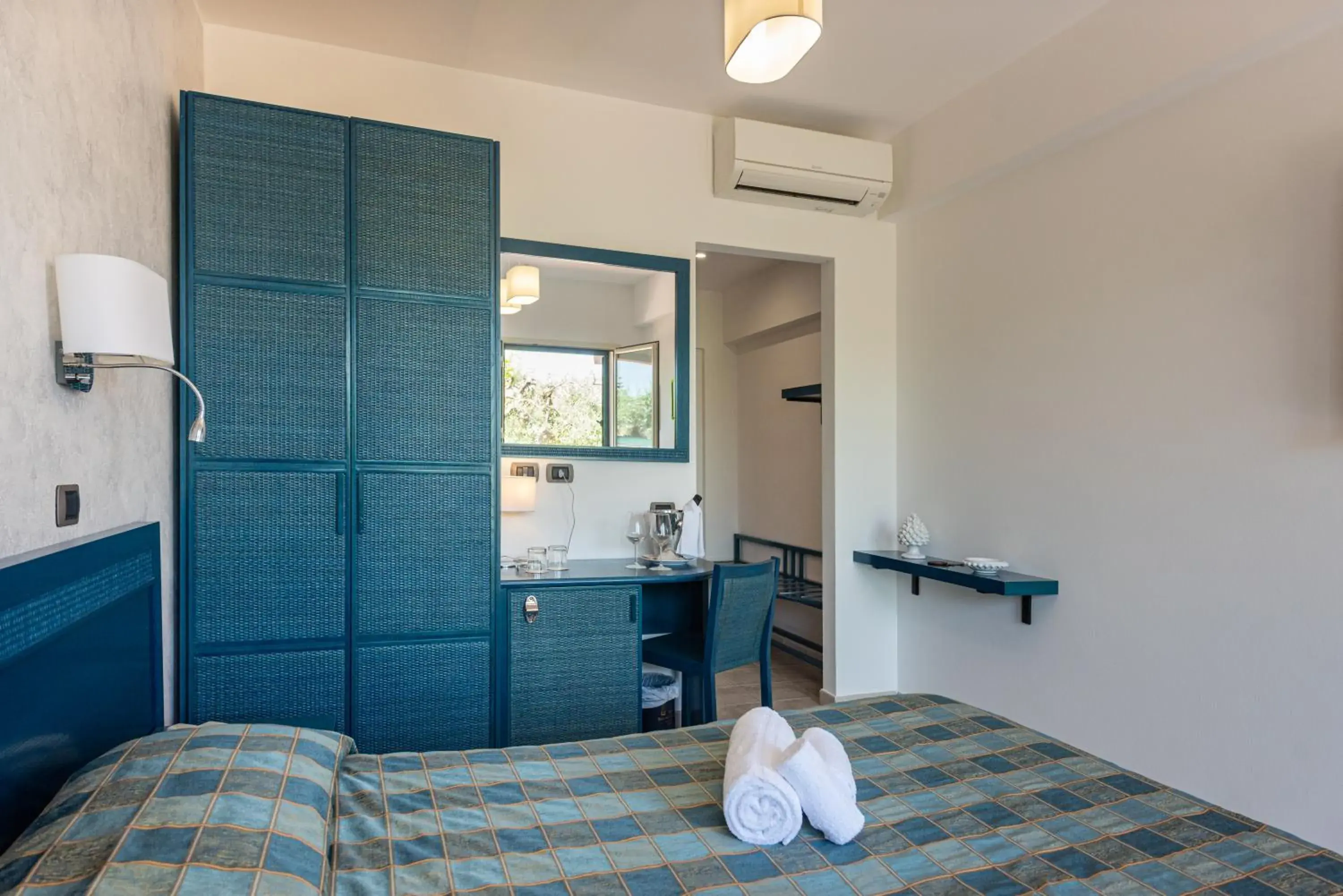 Bedroom, Bed in Hotel Baia Del Capitano Bedroom, Bed in Hotel Baia Del Capitano