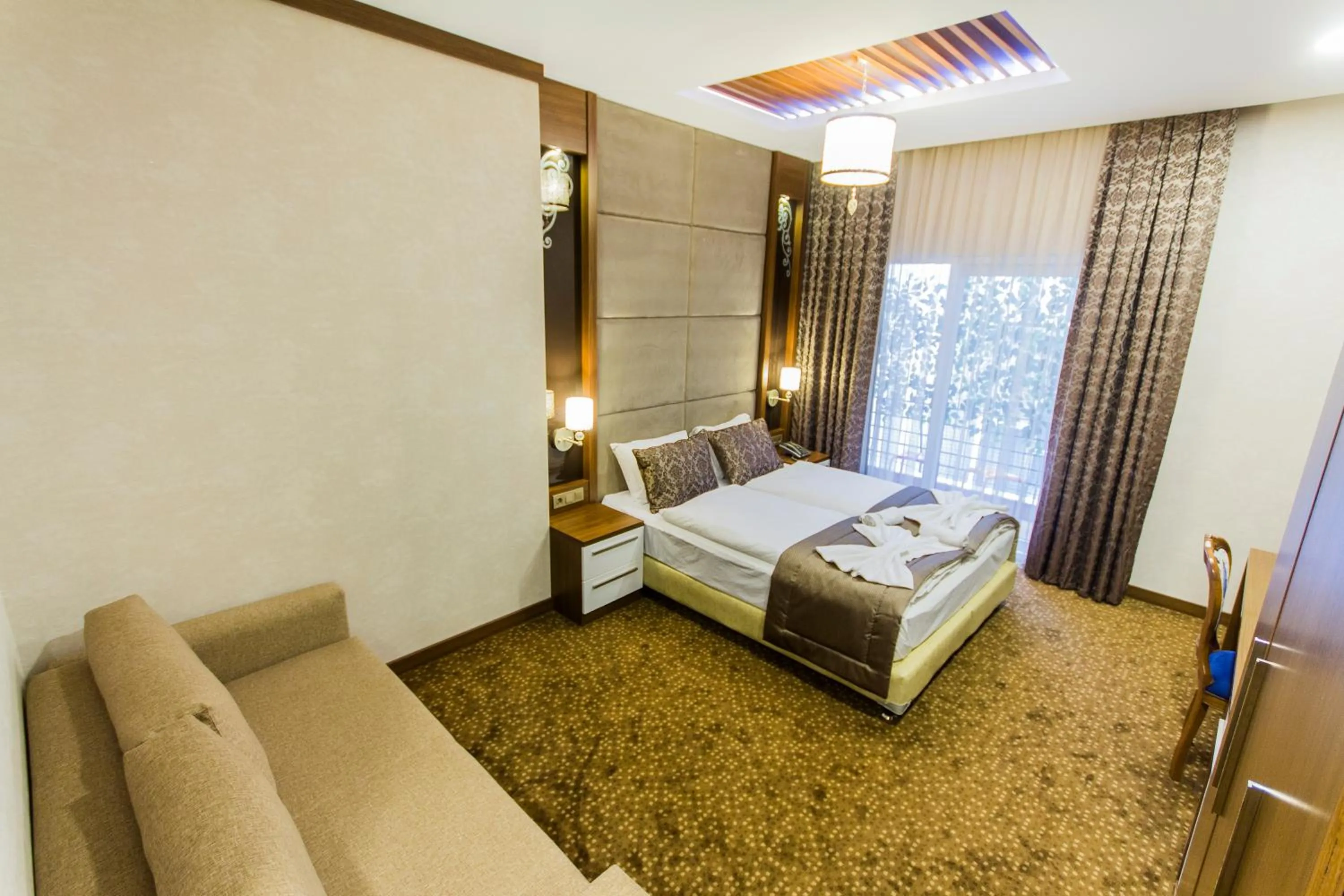 Bed in Taksim Cihangir Fidan Residence Hotel
