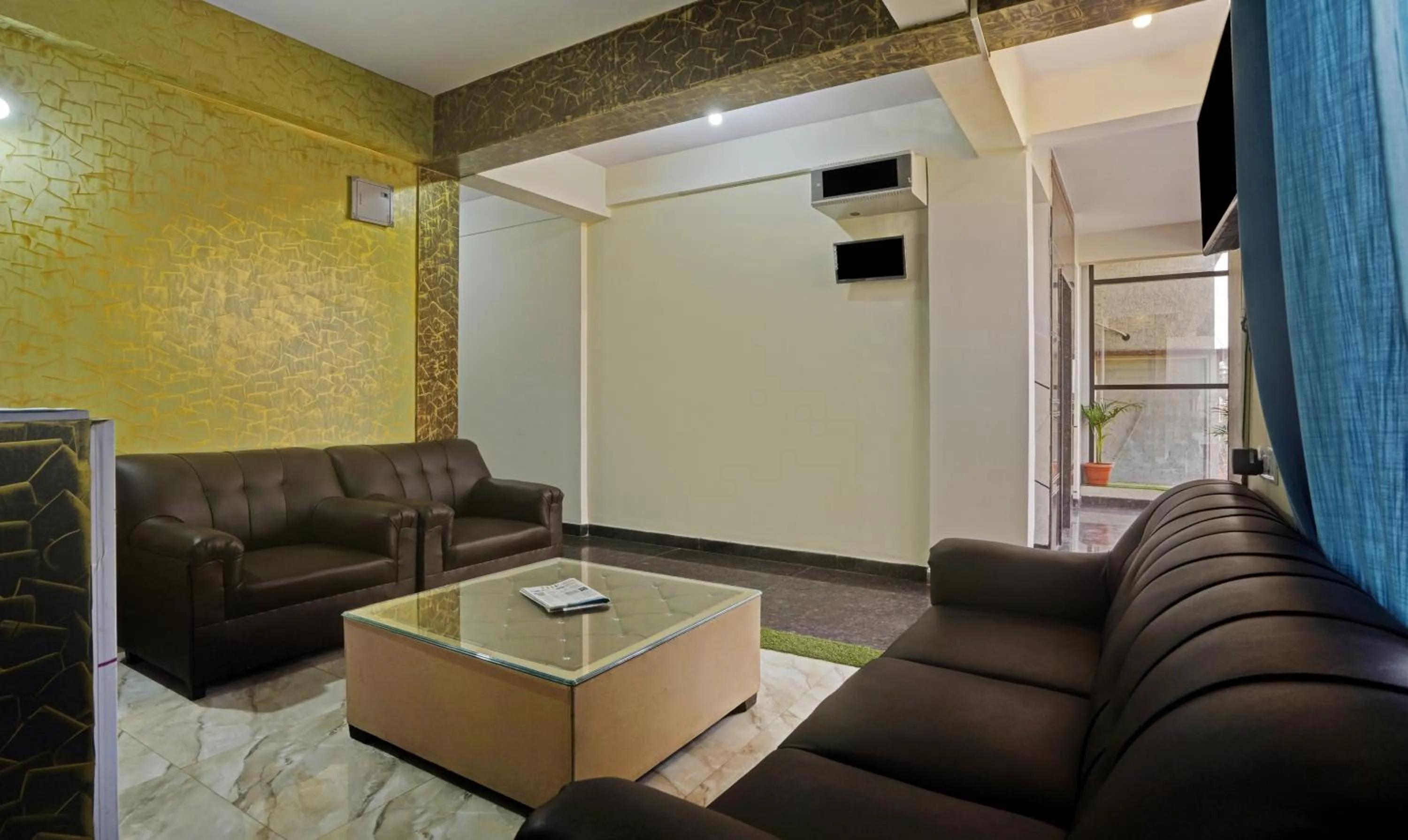 Seating area in Hotel Galaxy Suites Hebbal