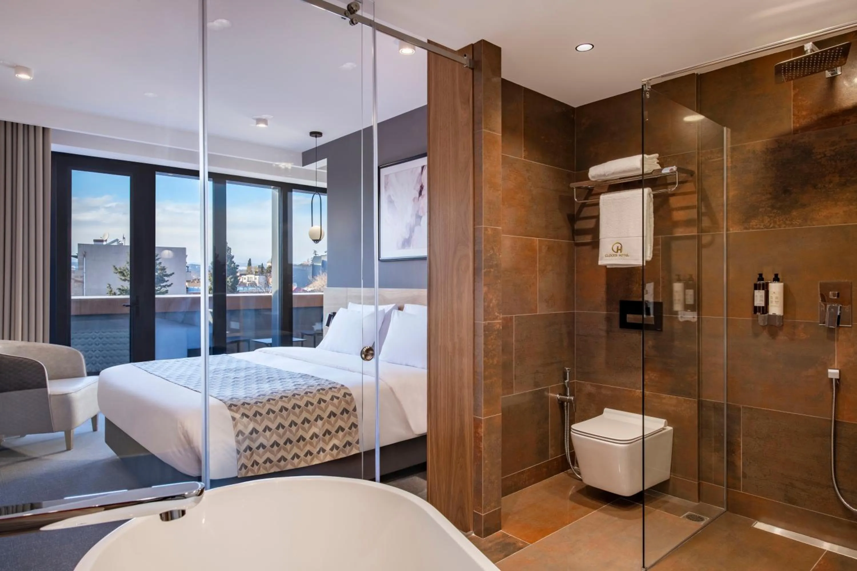 Toilet, Bed in Clocks Hotel Tbilisi