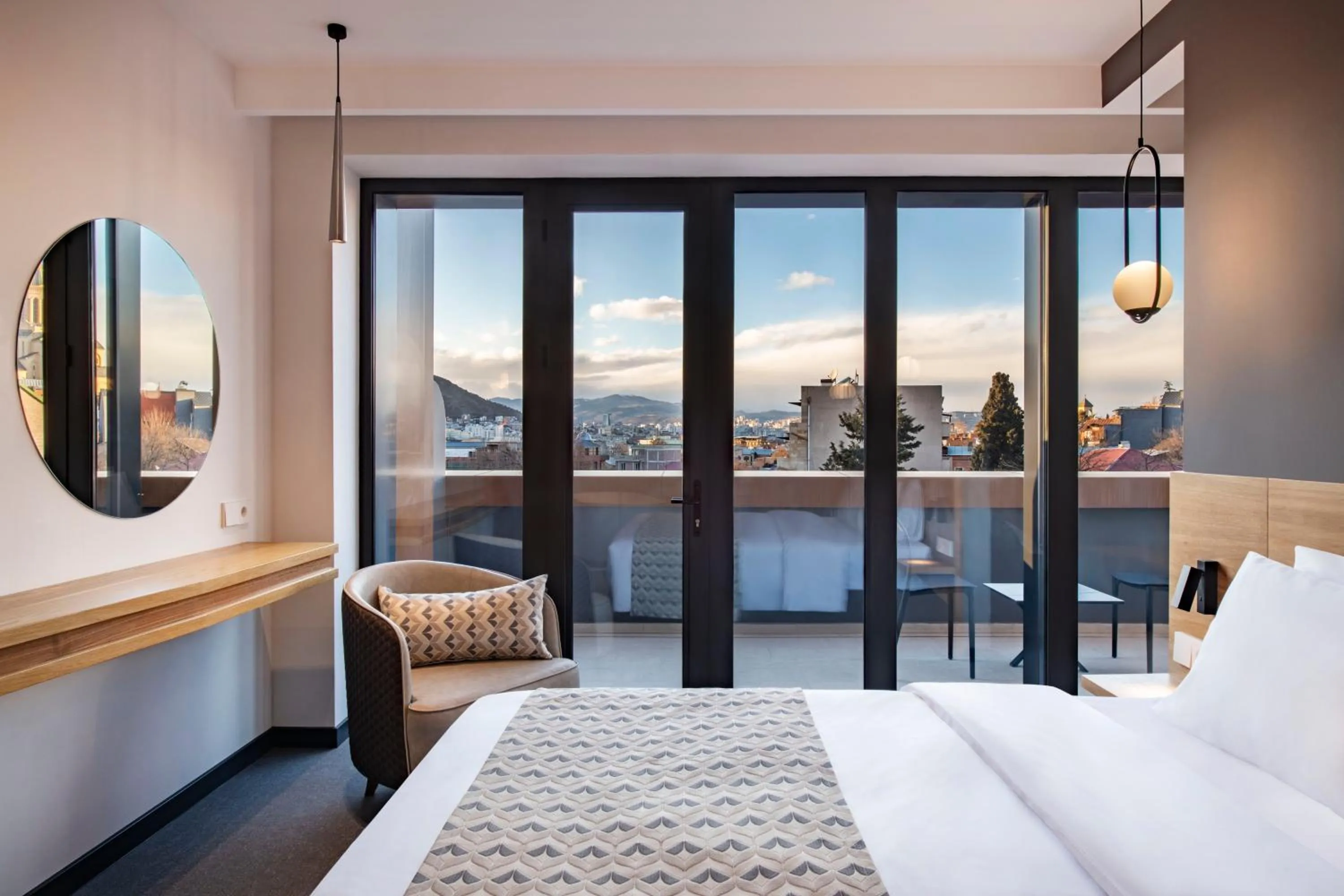 Bed in Clocks Hotel Tbilisi