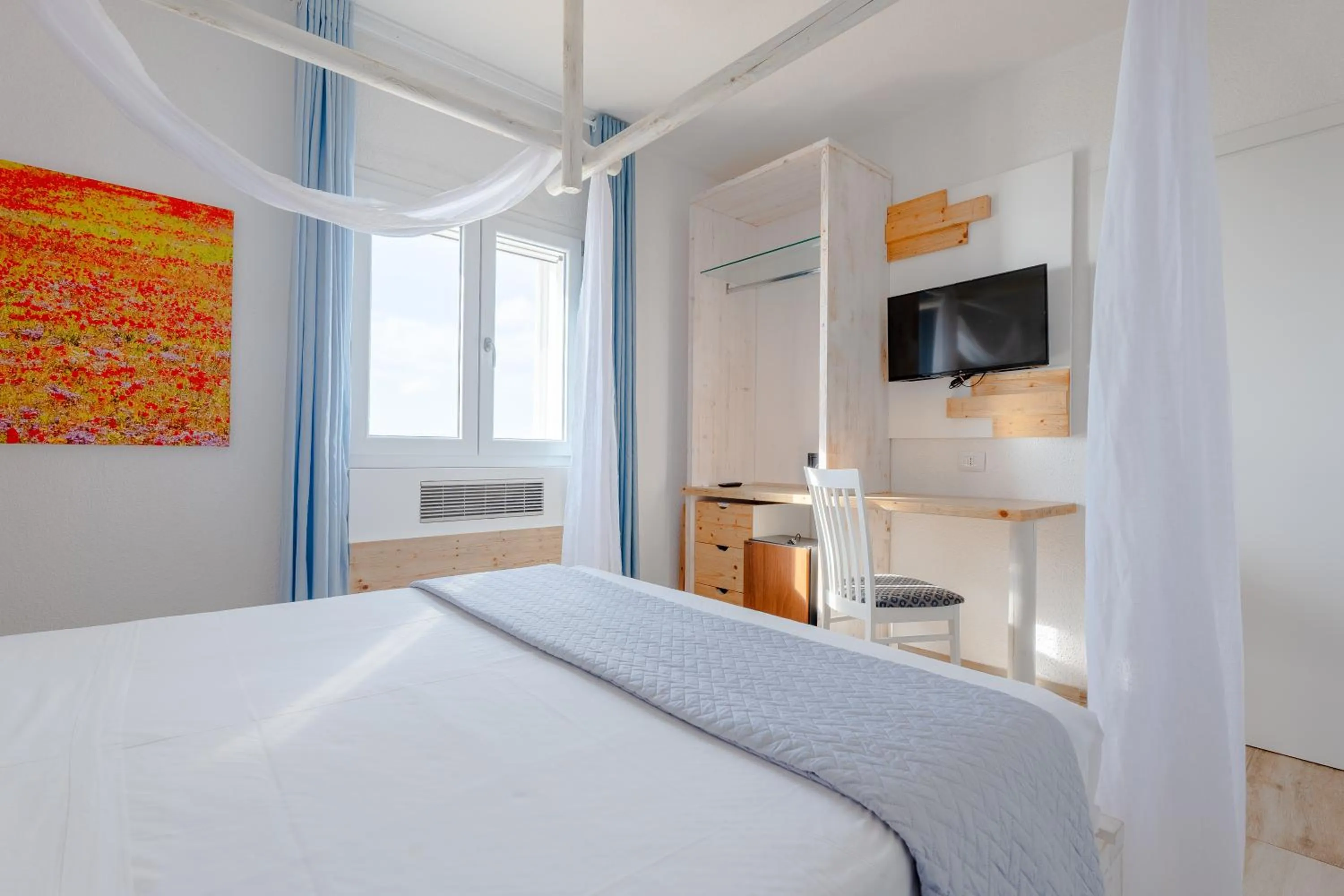 Bed in Hotel Lo Scoglio