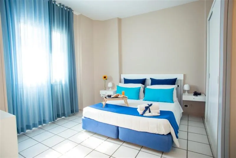 Bed in Hotel Lo Scoglio