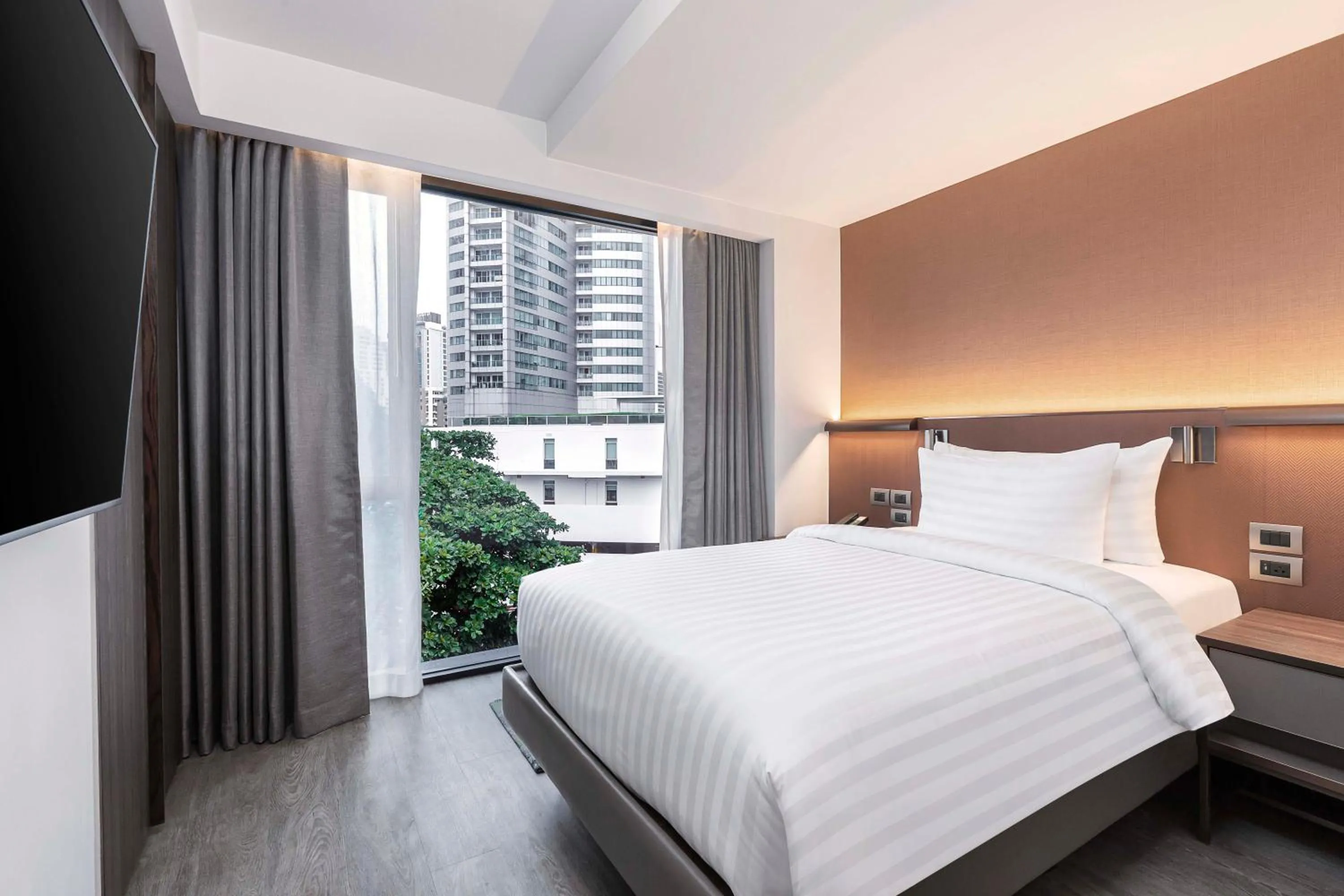 Bed in Gardina Asoke Hotel & Residence