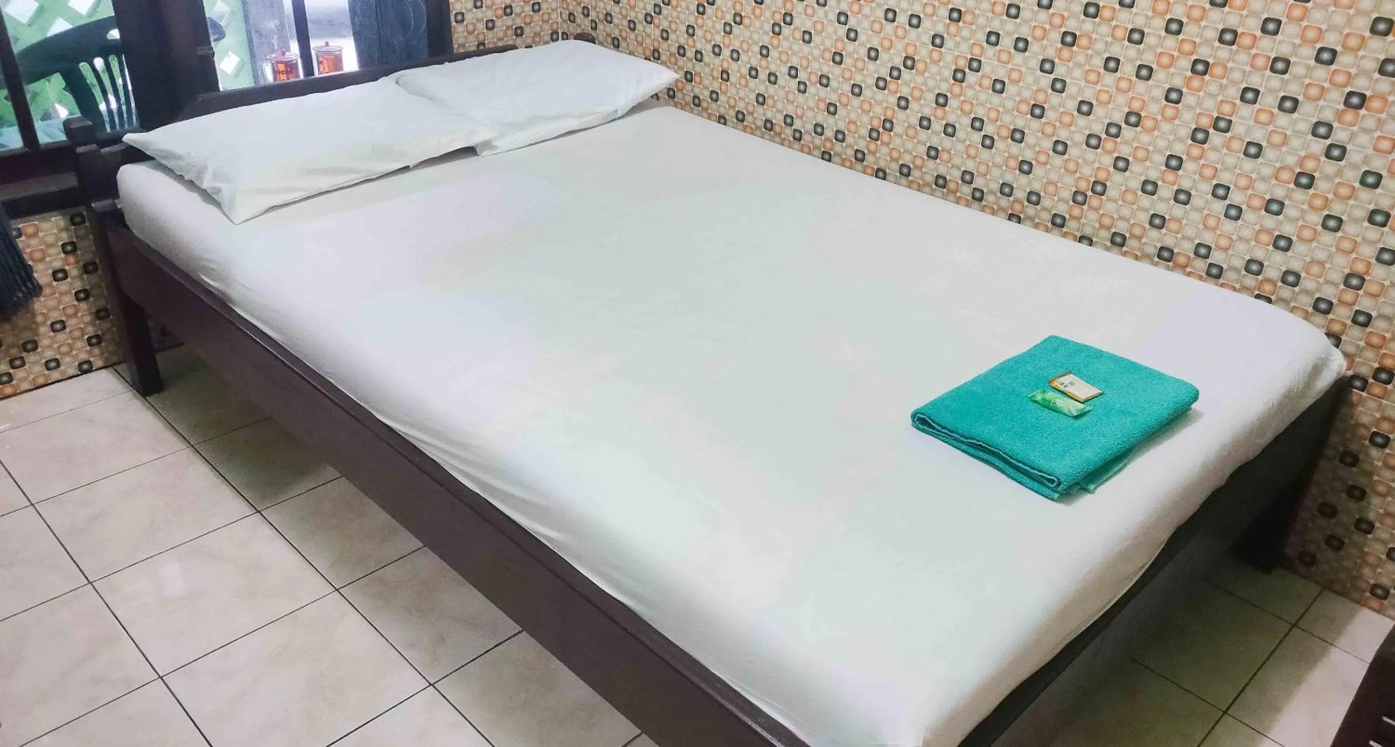 Bedroom, Bed in Bayu Murti Inn Kaliurang Yogyakarta RedPartner