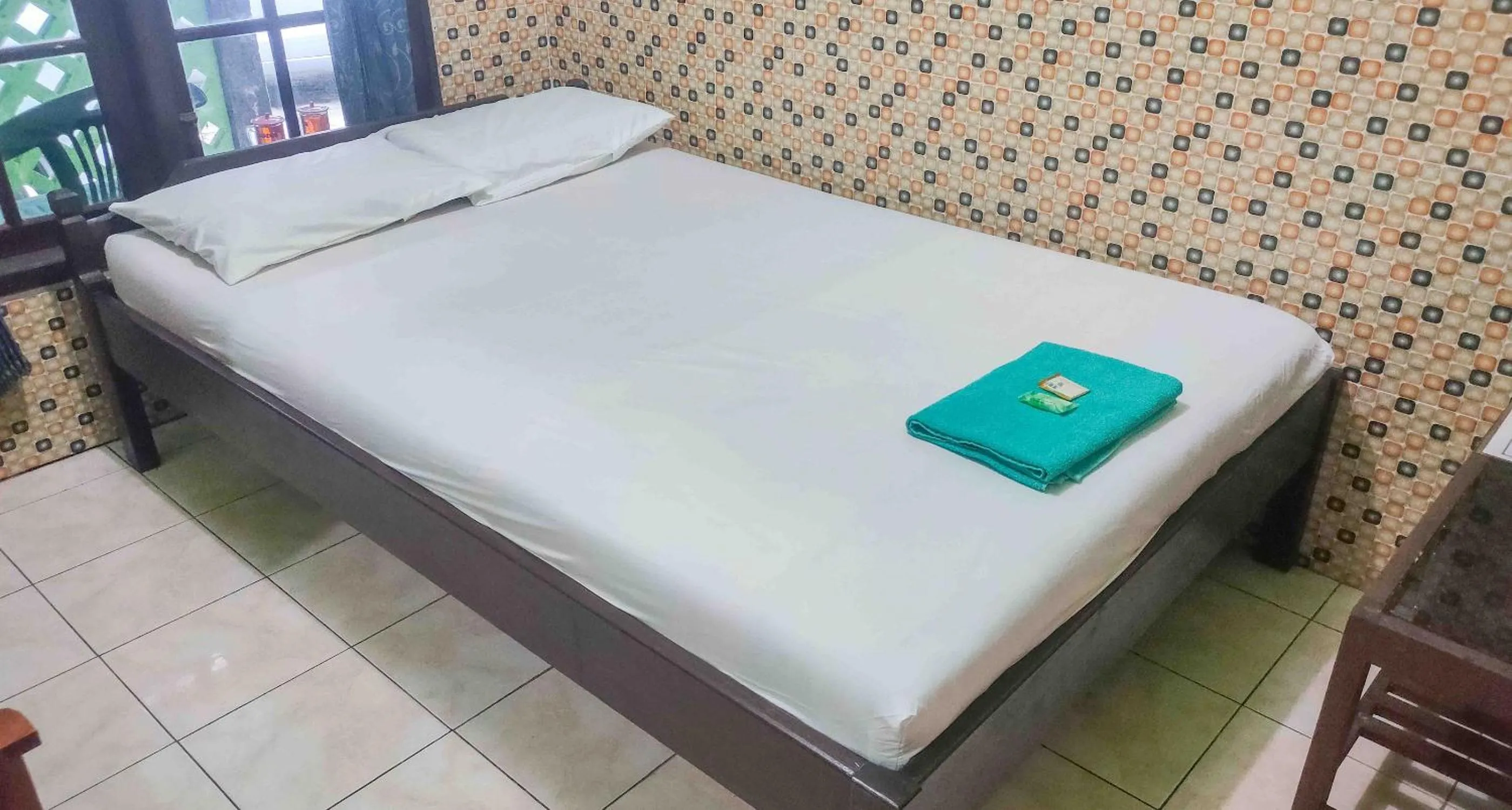 Bedroom, Bed in Bayu Murti Inn Kaliurang Yogyakarta RedPartner