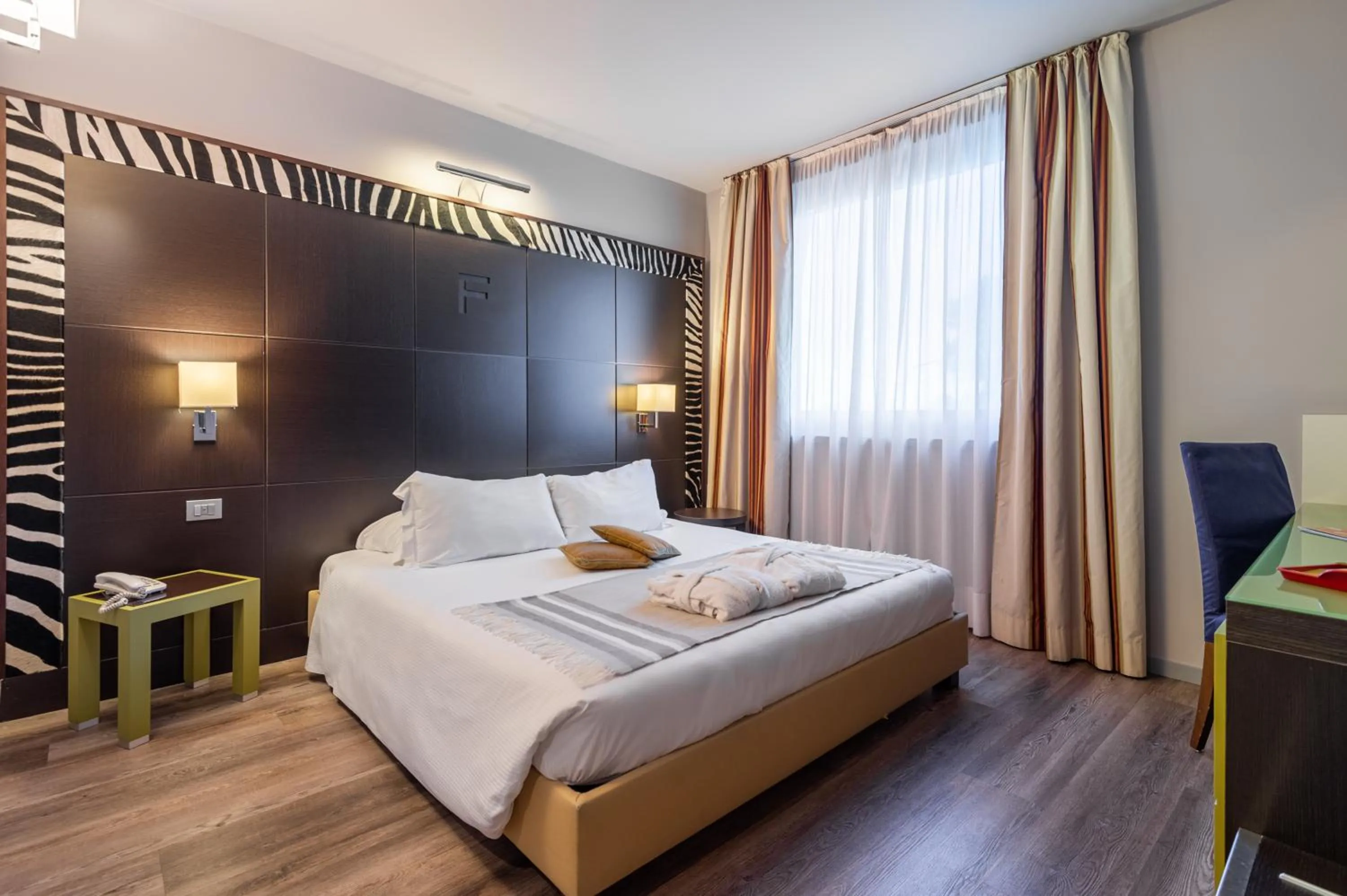 Photo of the whole room, Bed in First Hotel Malpensa