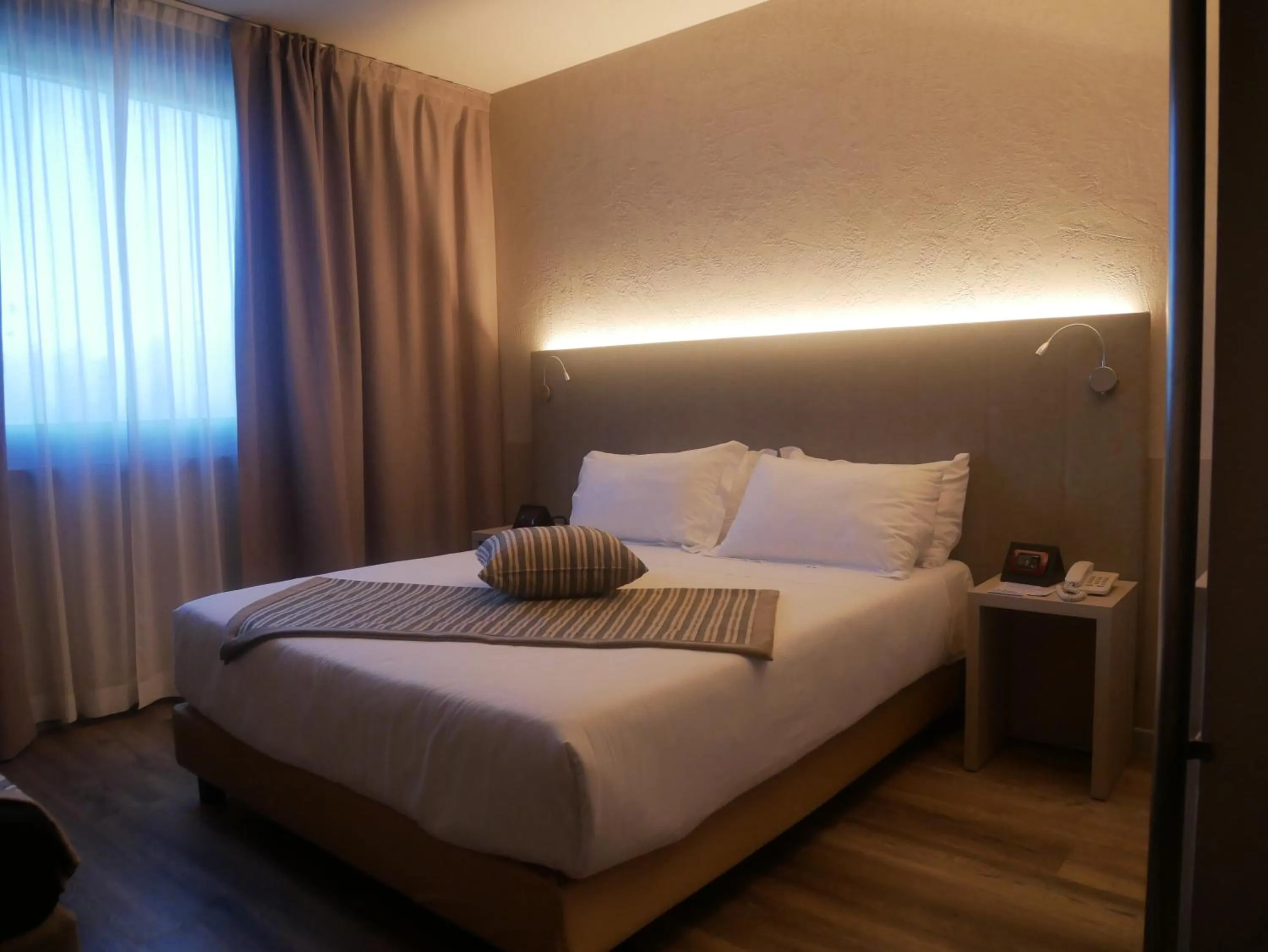 Bed in First Hotel Malpensa