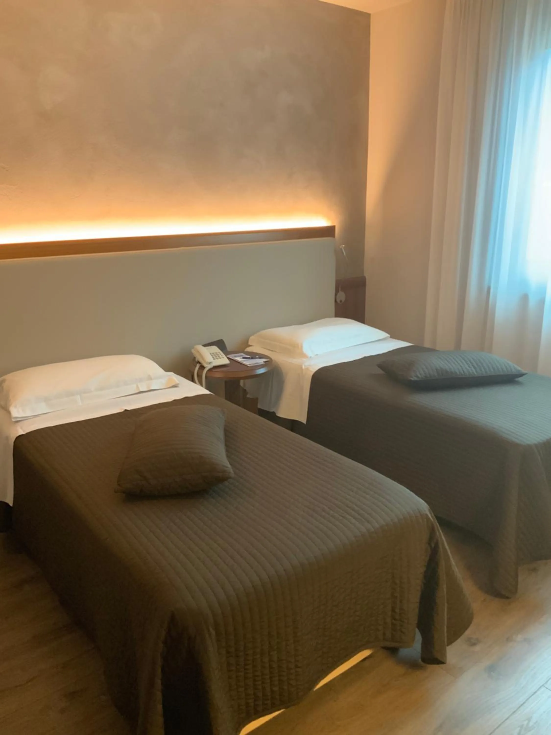 Photo of the whole room, Bed in First Hotel Malpensa