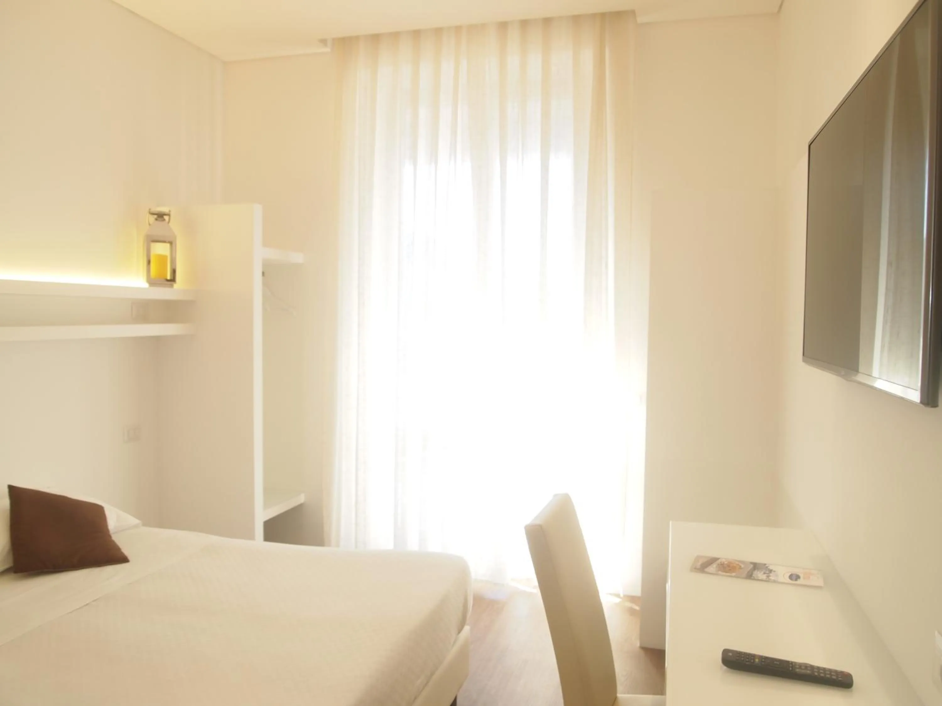 Photo of the whole room, Bed in Soggiorno Lo Stellino