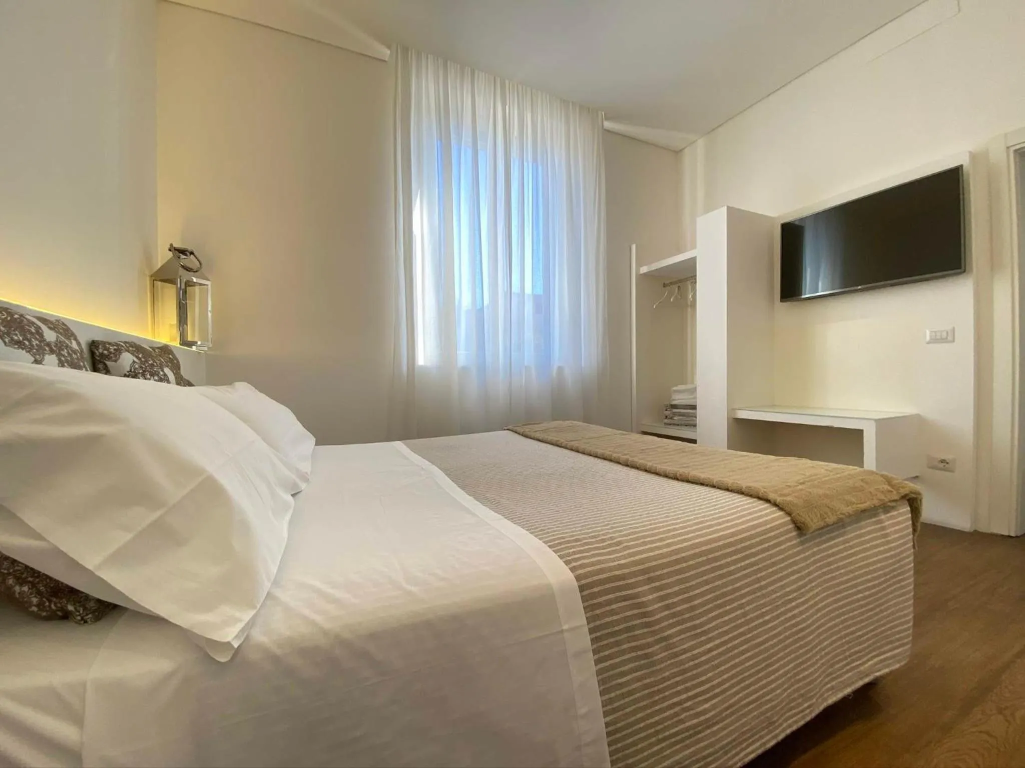 Photo of the whole room, Bed in Soggiorno Lo Stellino