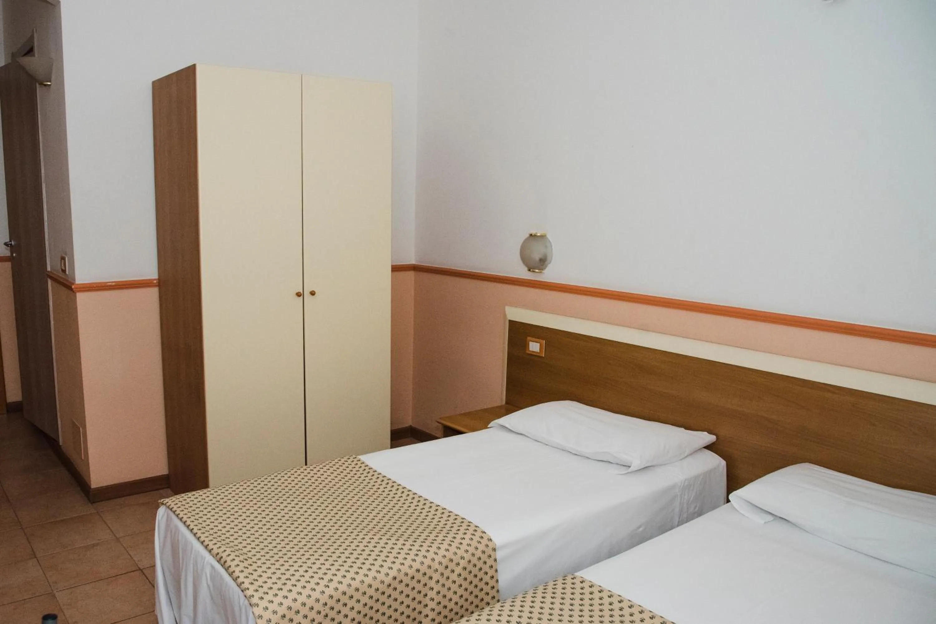 Bed in Hotel Corallo