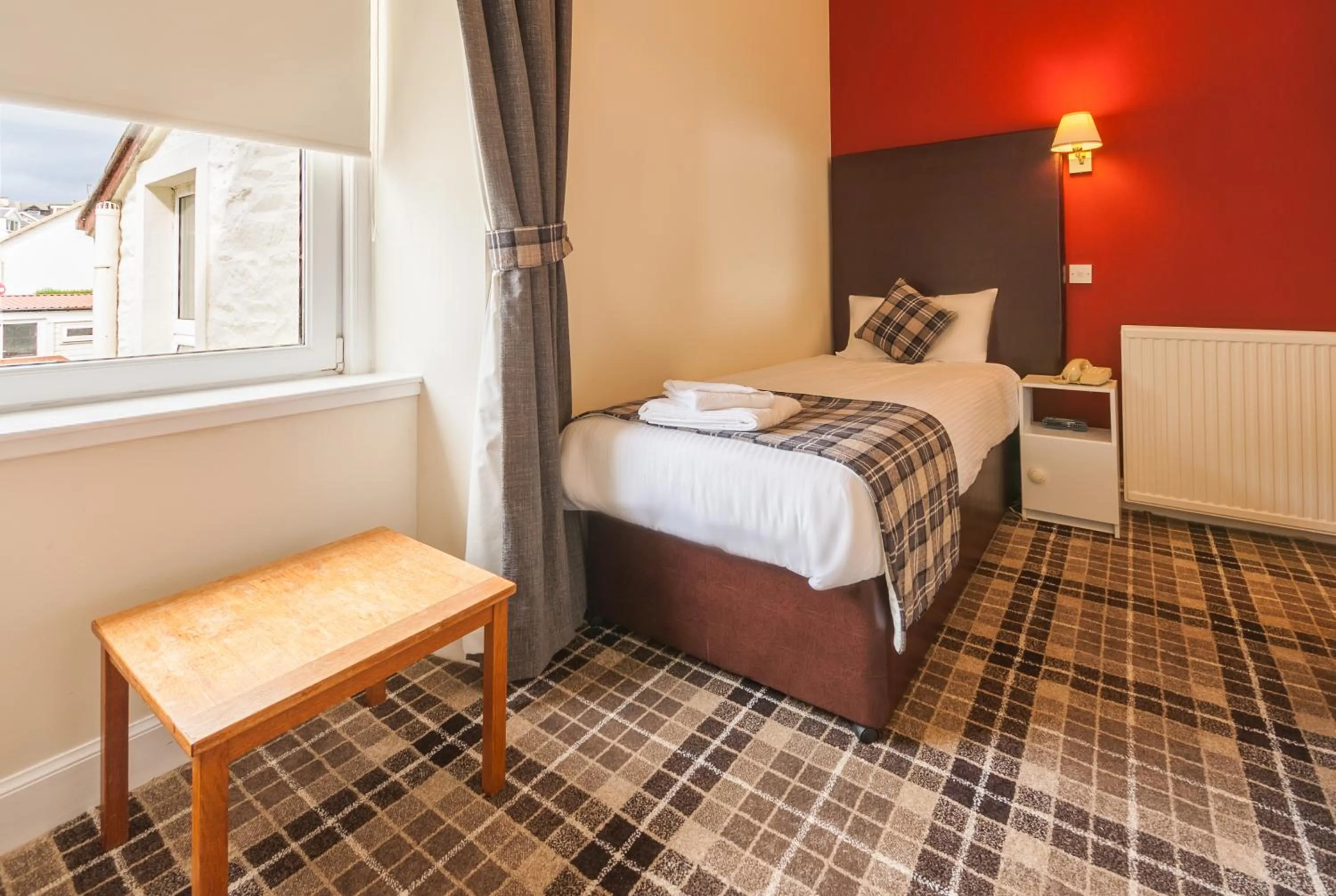 Bed in SGE Esplanade Hotel