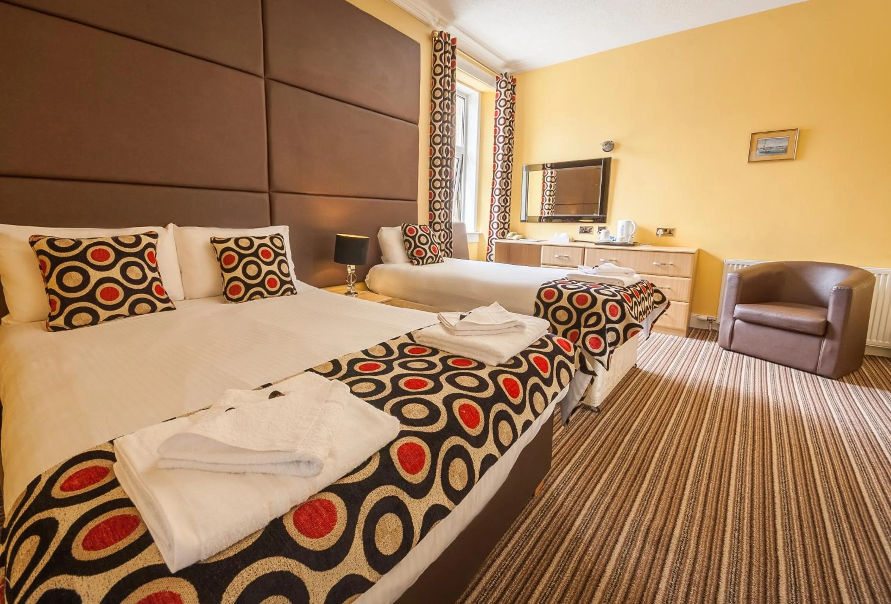 Bed in SGE Esplanade Hotel