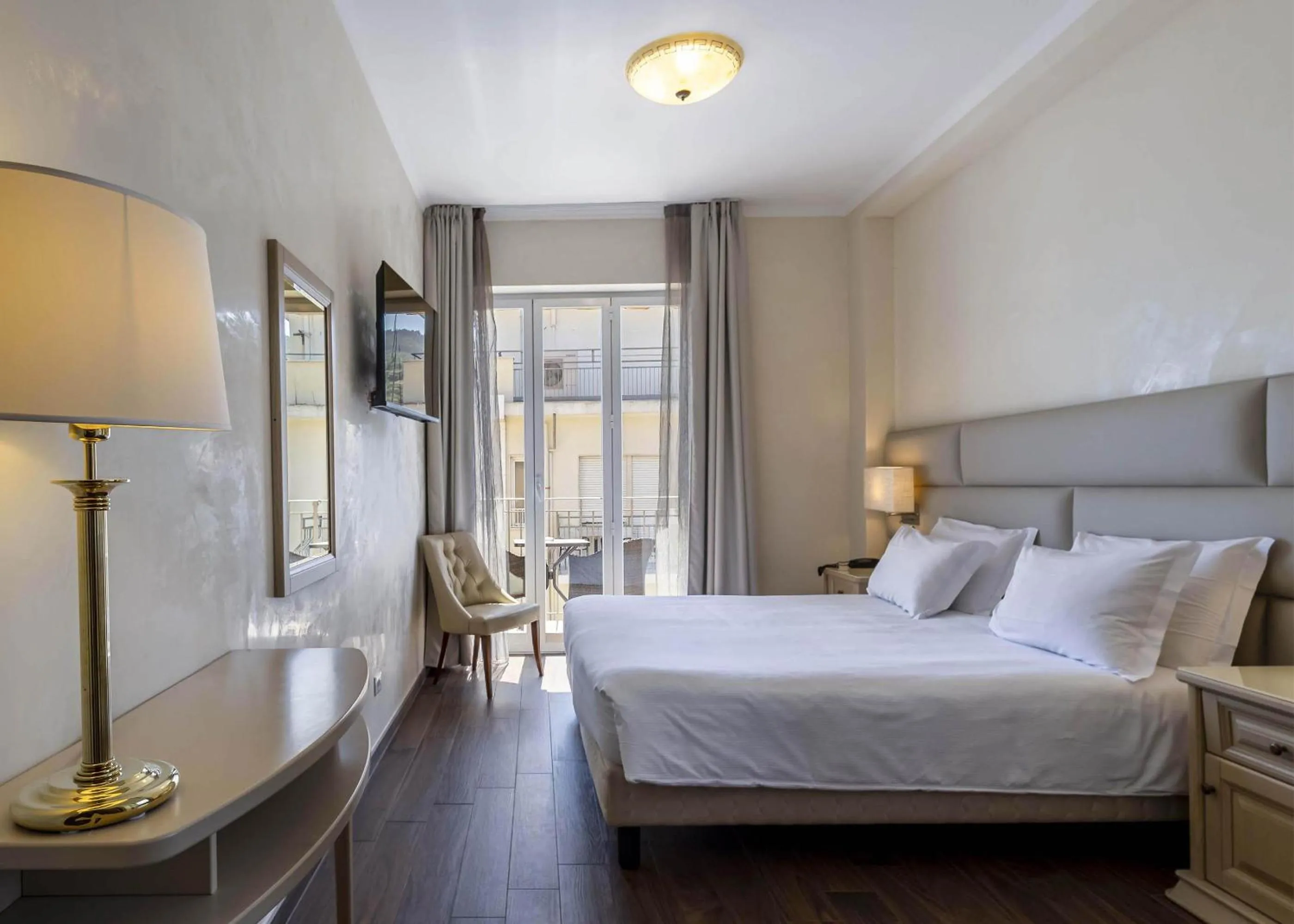 Photo of the whole room, Bed in B&B HOTEL Diano Marina Palace