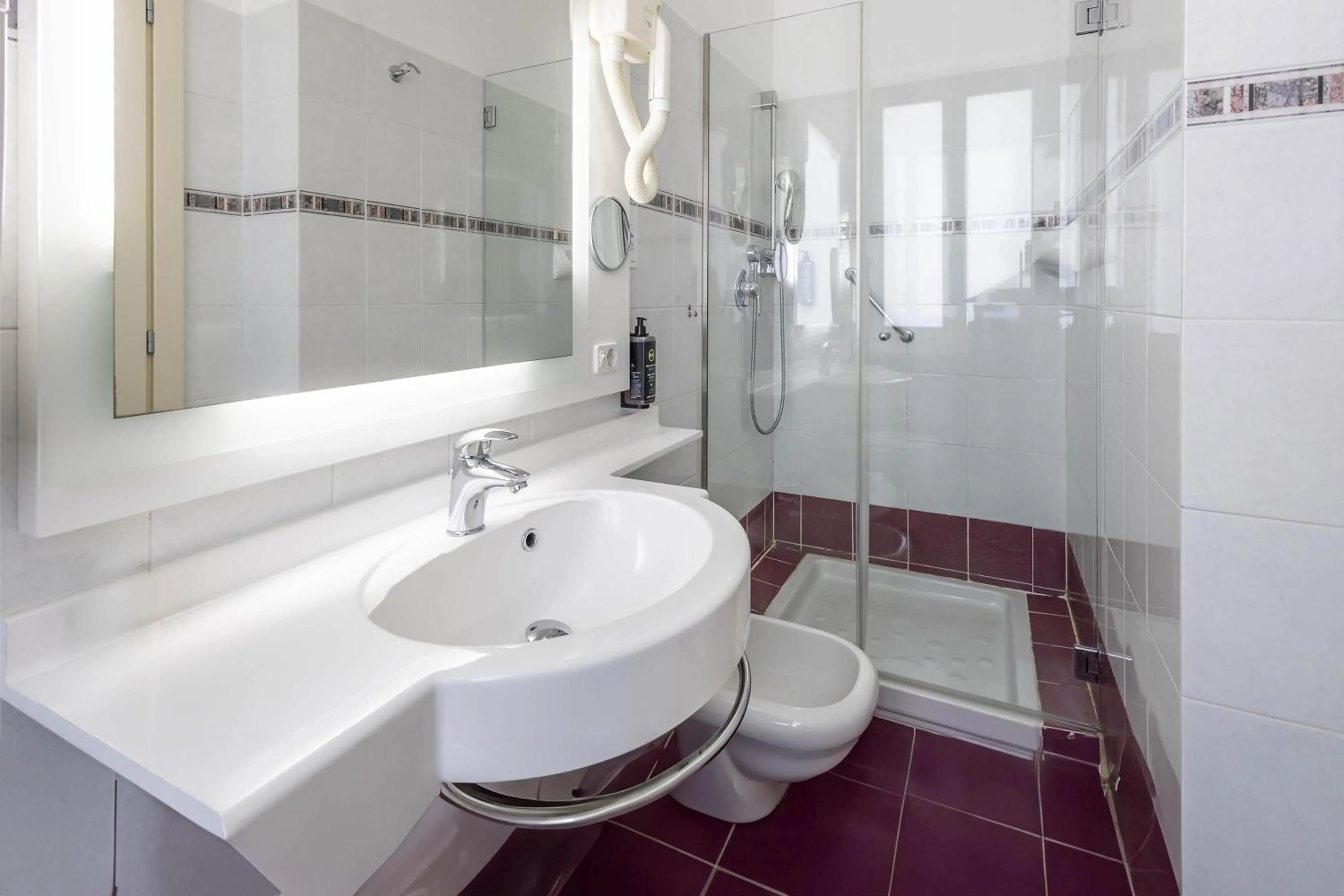 Photo of the whole room in B&B HOTEL Diano Marina Palace