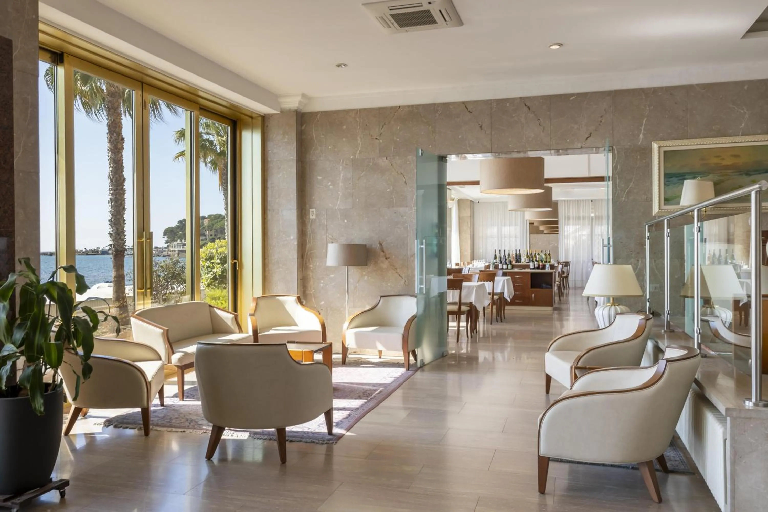 Lobby or reception in B&B HOTEL Diano Marina Palace