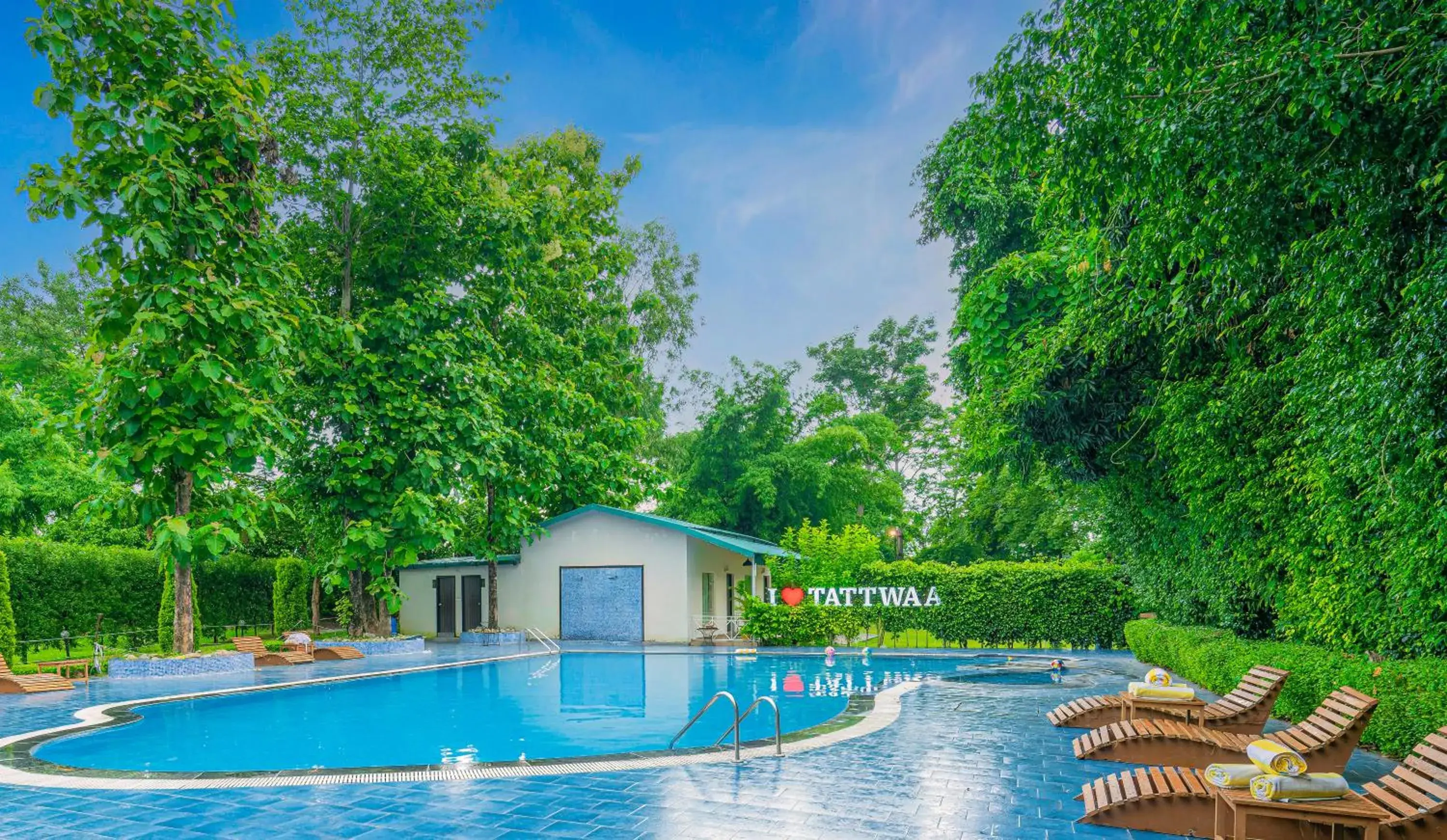 Swimming pool in The Tattwaa Corbett Spa and Resort Swimming pool in The Tattwaa Corbett Spa and Resort