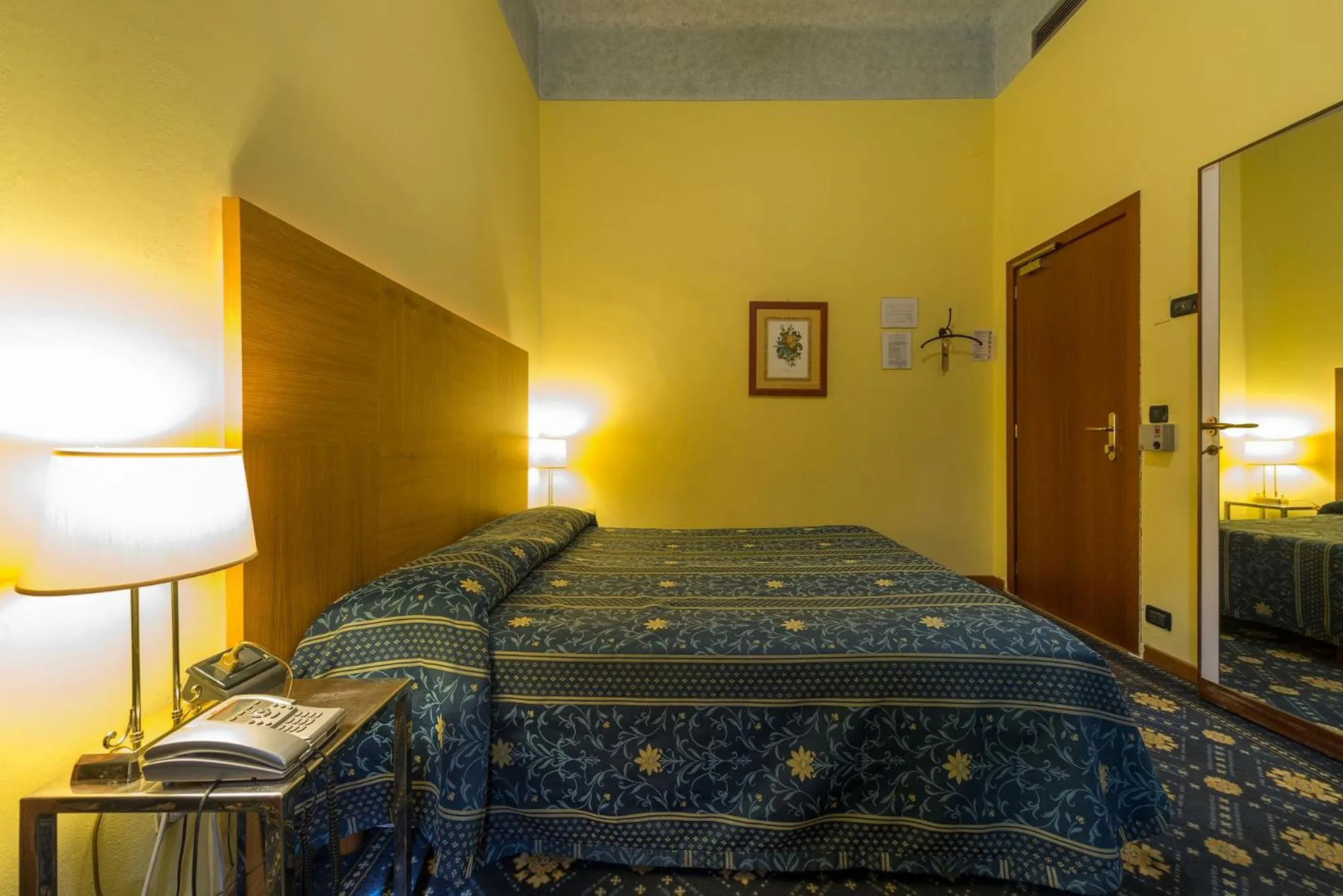 Bed in Hotel Corallo