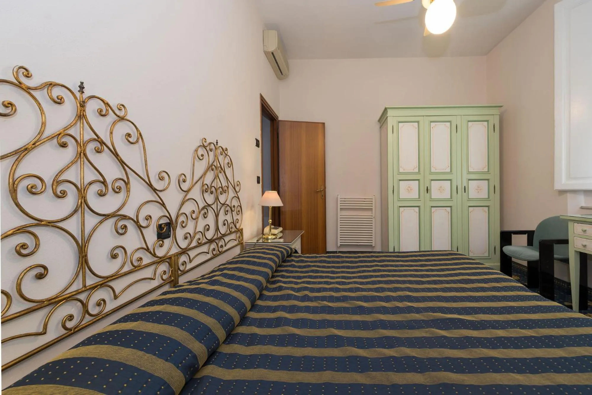 Bed in Hotel Corallo