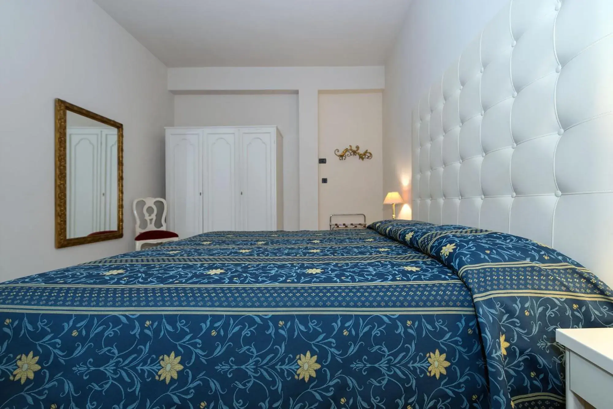 Triple Room in Hotel Corallo Triple Room in Hotel Corallo