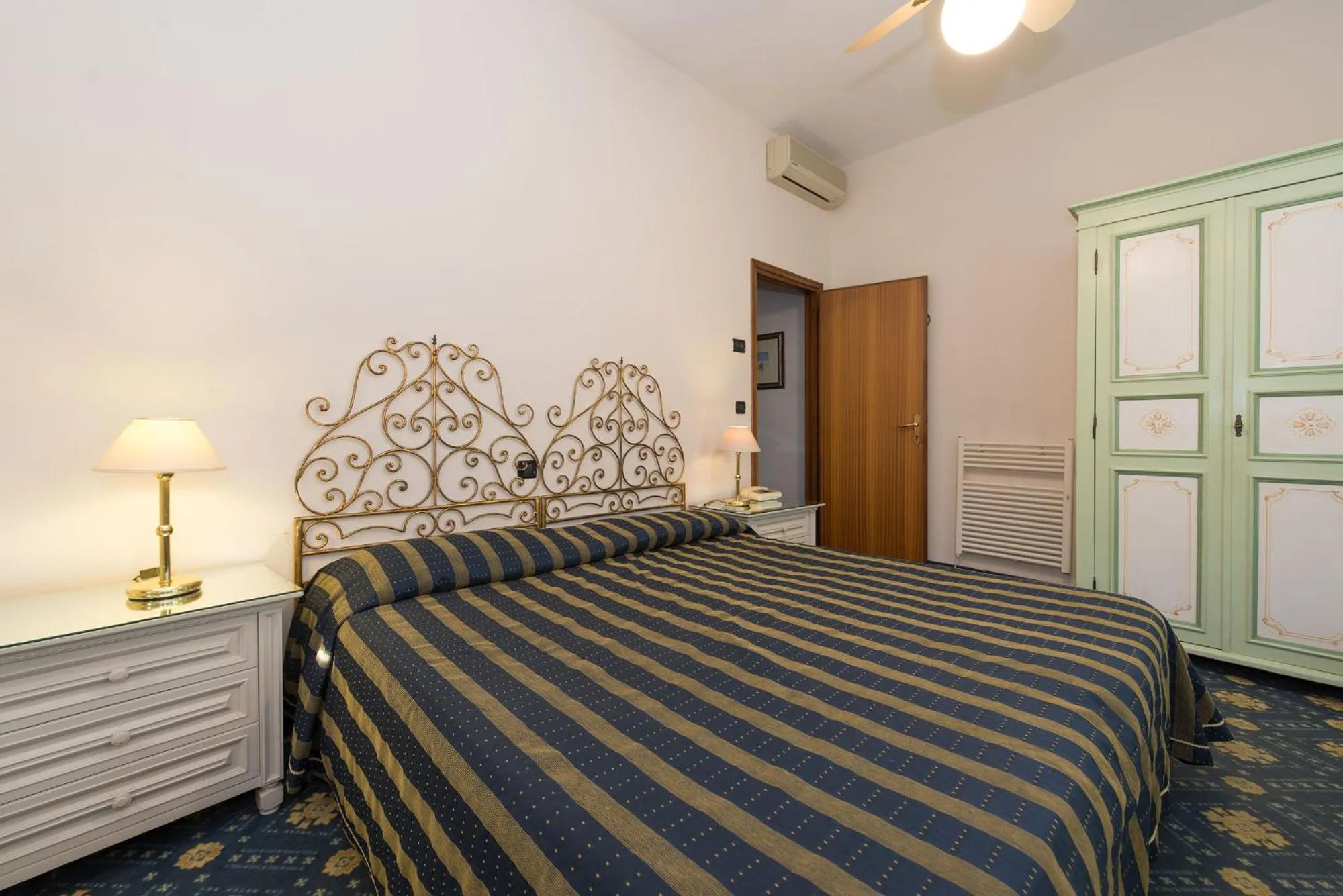 Bed in Hotel Corallo