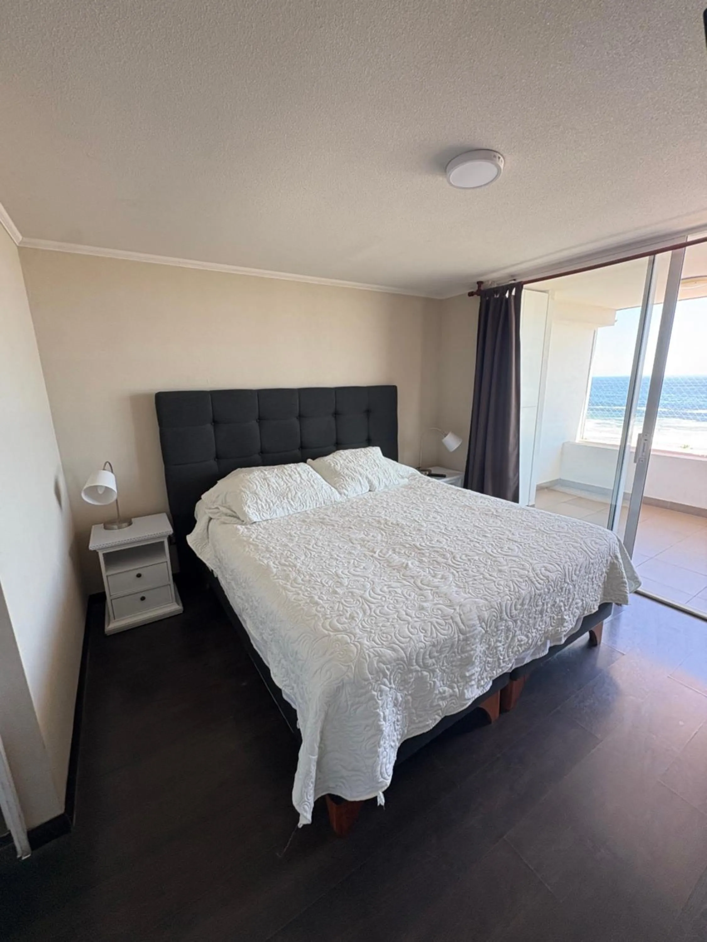 Bedroom, Bed in Departamento frente al mar Iquique