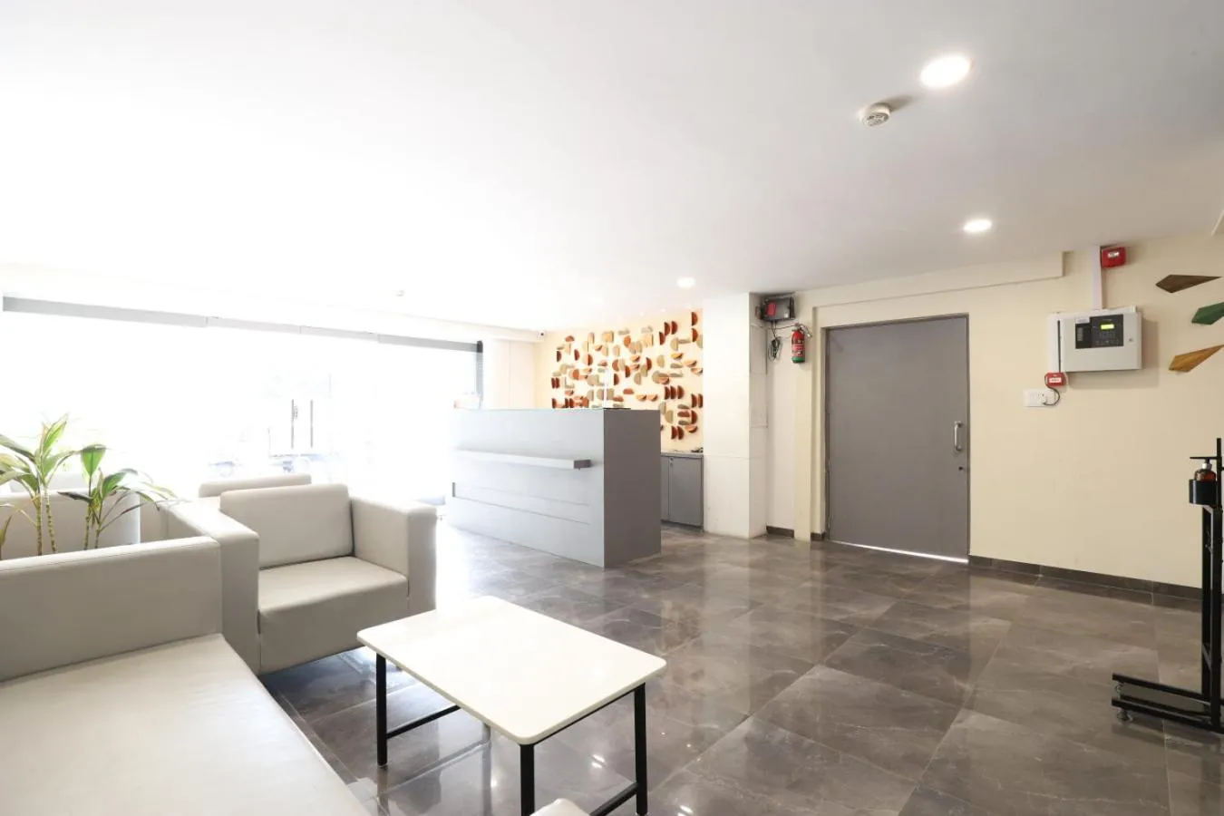 Lobby or reception in Alba Premier, Ahmedabad