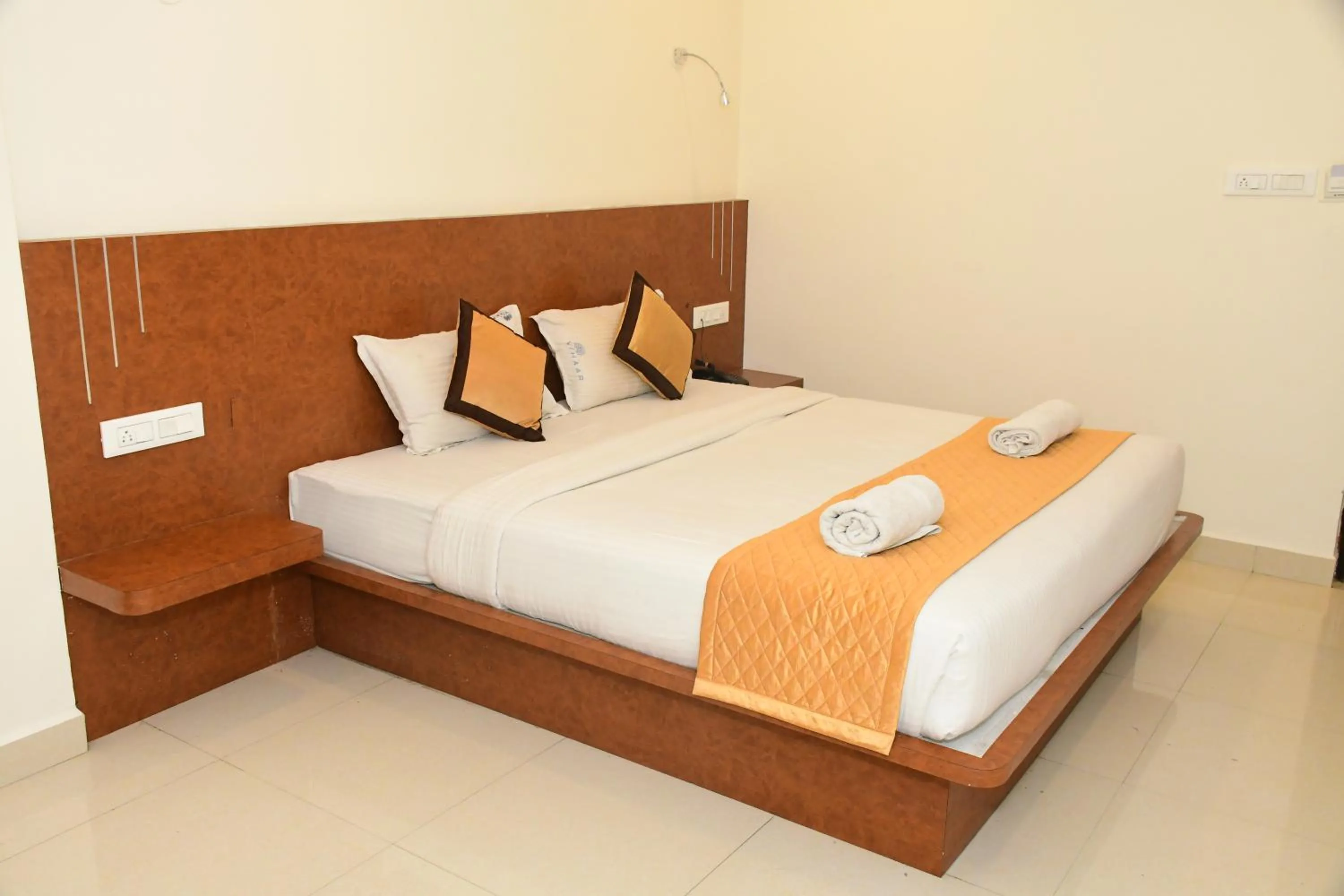Photo of the whole room, Bed in Sai Vihaar Inn & Suites