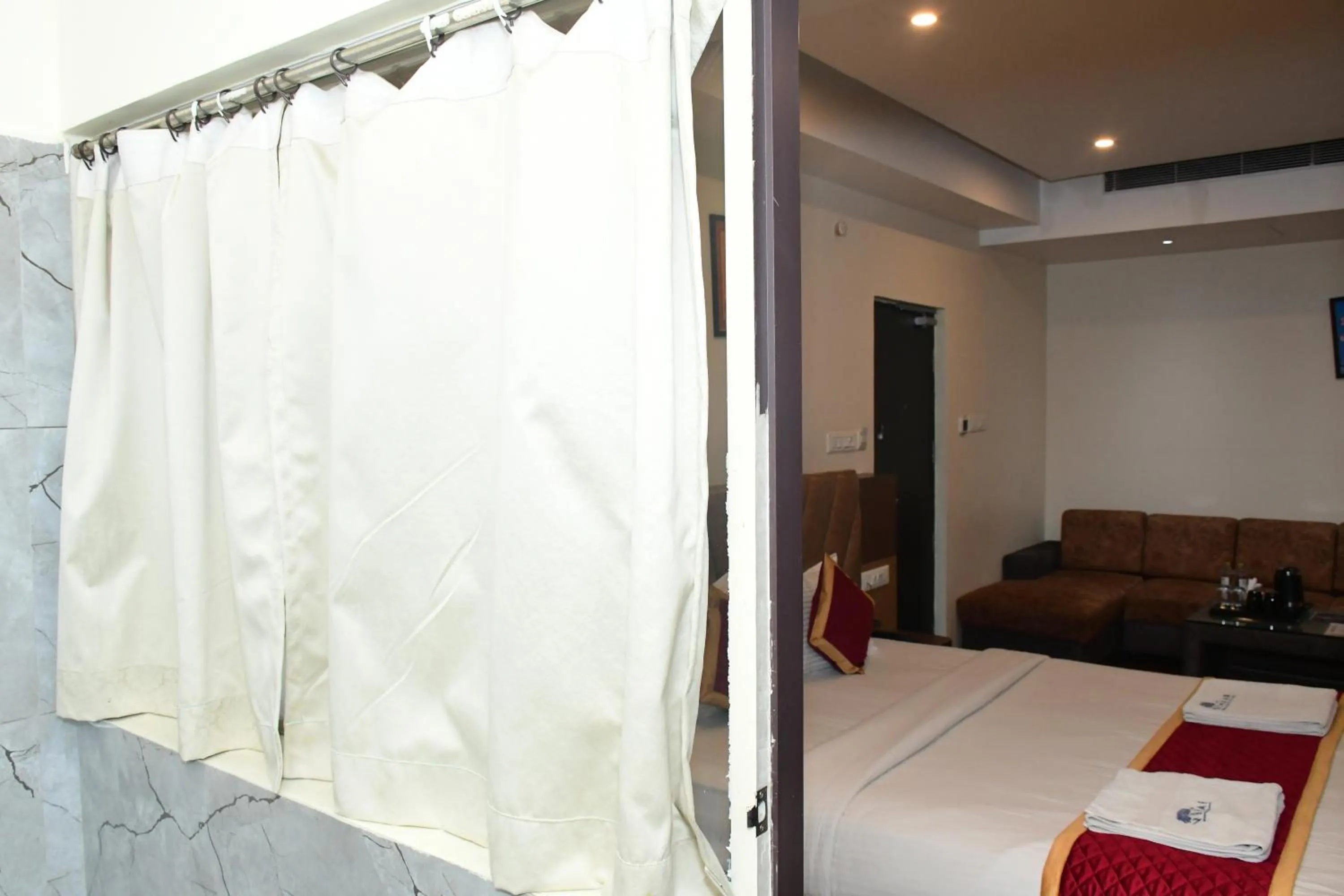 Photo of the whole room, Bed in Sai Vihaar Inn & Suites