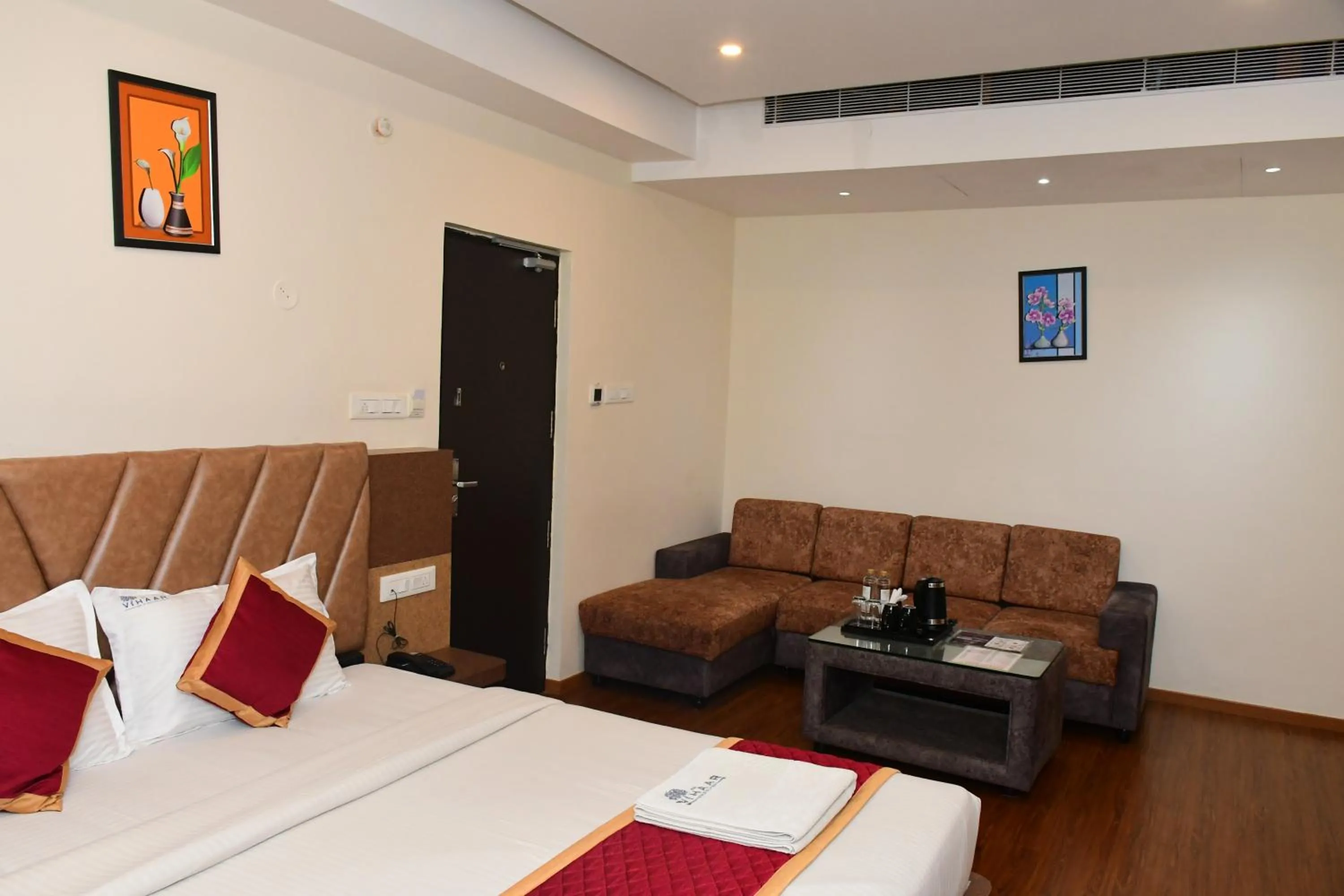 Photo of the whole room, Bed in Sai Vihaar Inn & Suites