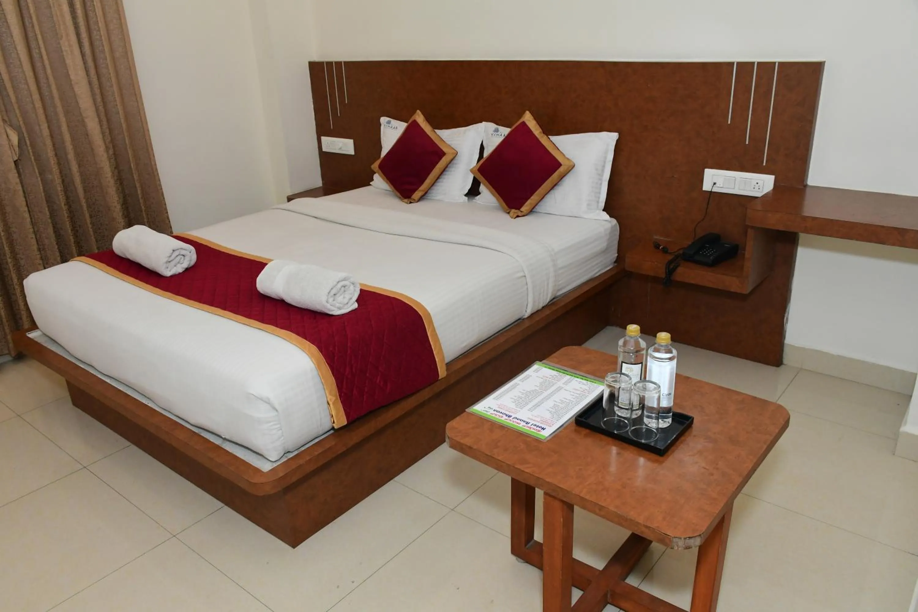 Photo of the whole room, Bed in Sai Vihaar Inn & Suites