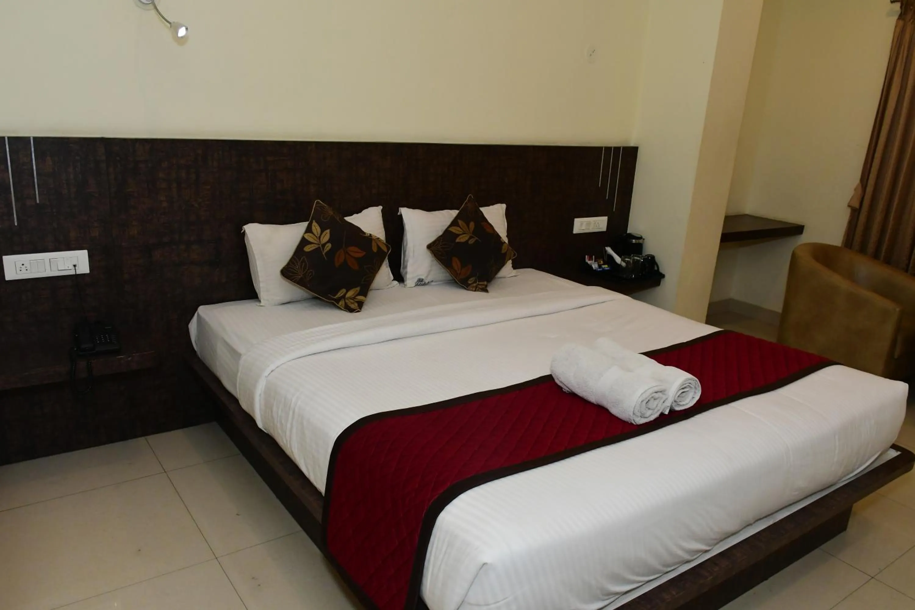 Bedroom, Bed in Sai Vihaar Inn & Suites