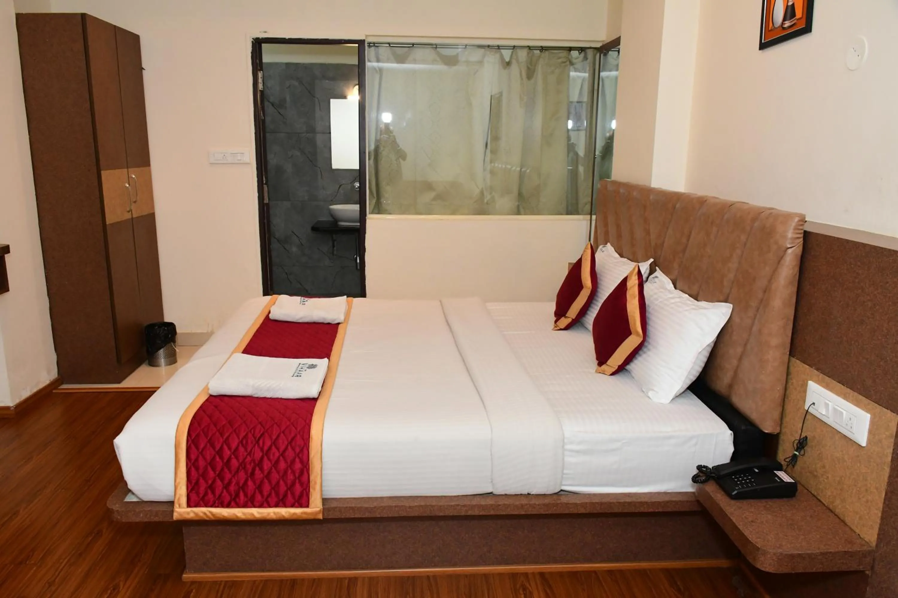 Bedroom, Bed in Sai Vihaar Inn & Suites