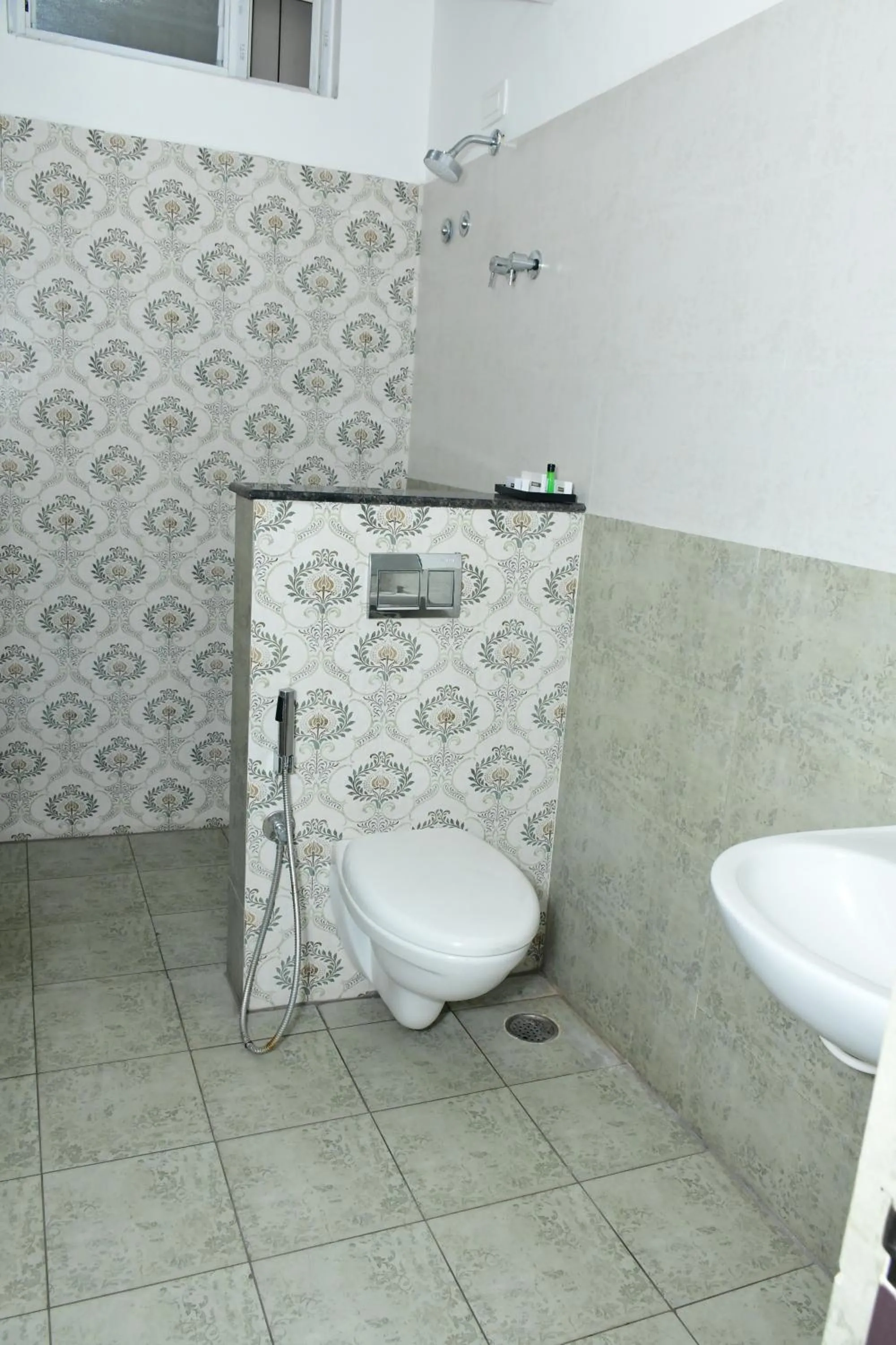 Bathroom in Sai Vihaar Inn & Suites