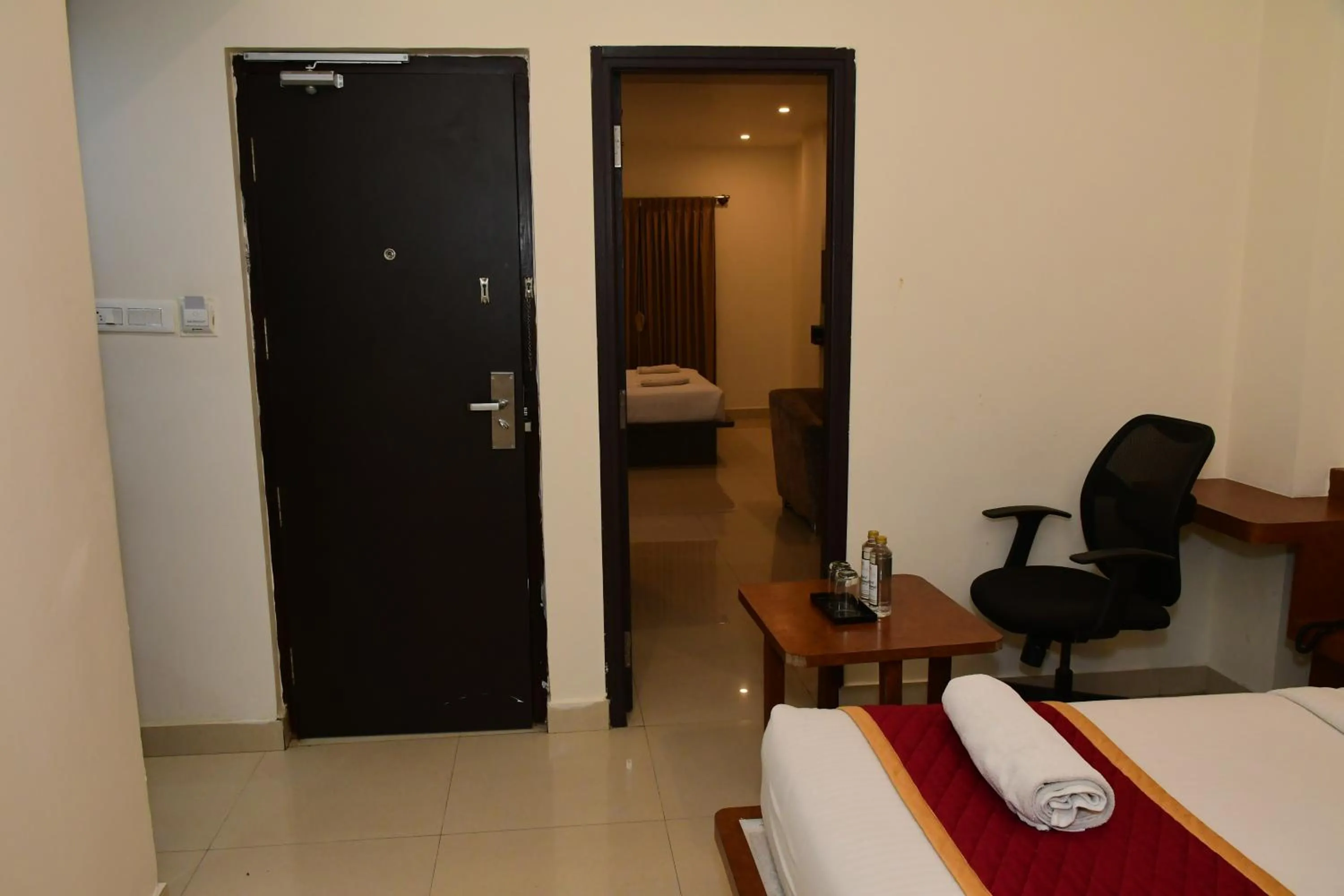 Photo of the whole room, Bed in Sai Vihaar Inn & Suites