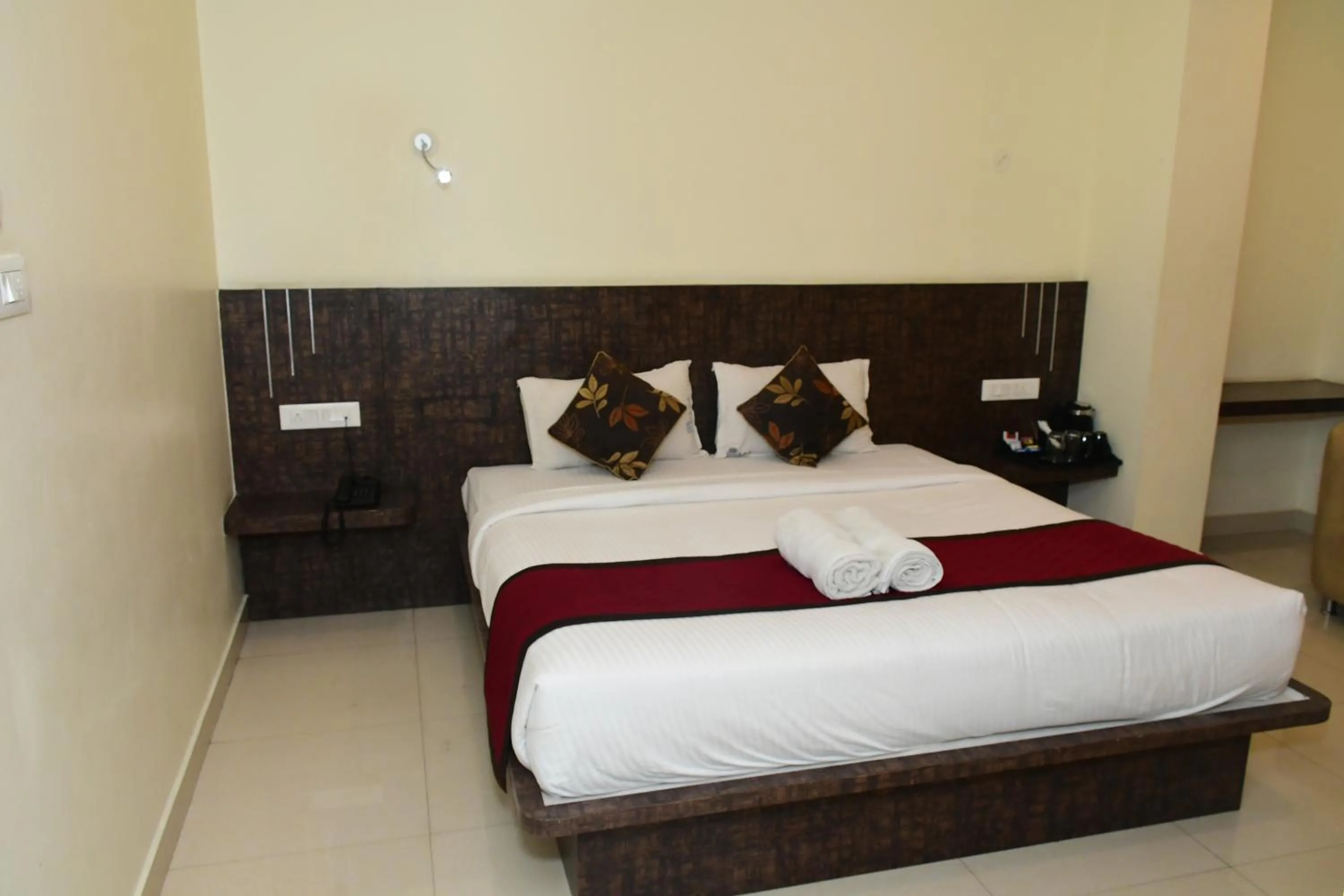 Bedroom, Bed in Sai Vihaar Inn & Suites