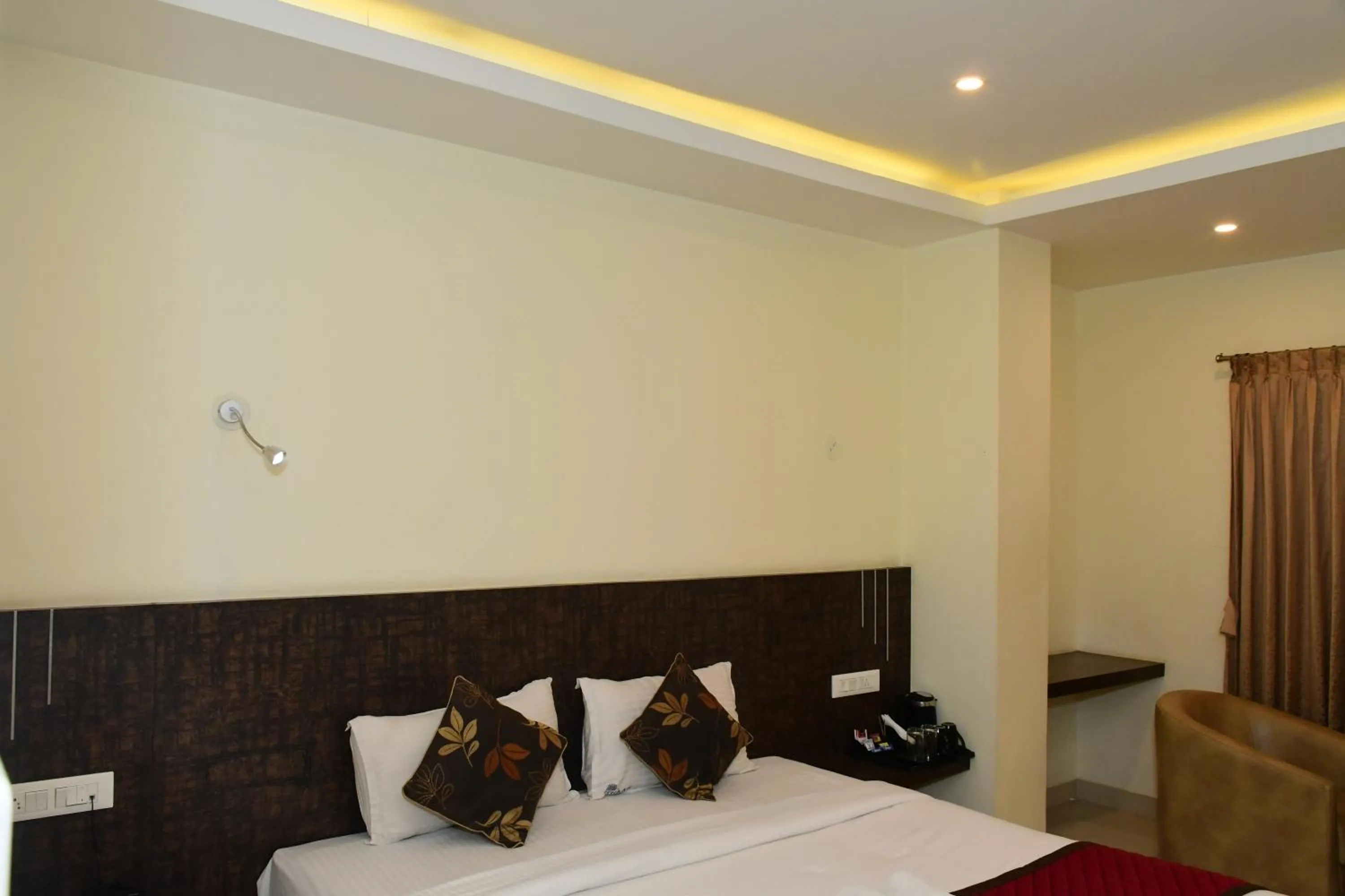 Bedroom, Bed in Sai Vihaar Inn & Suites