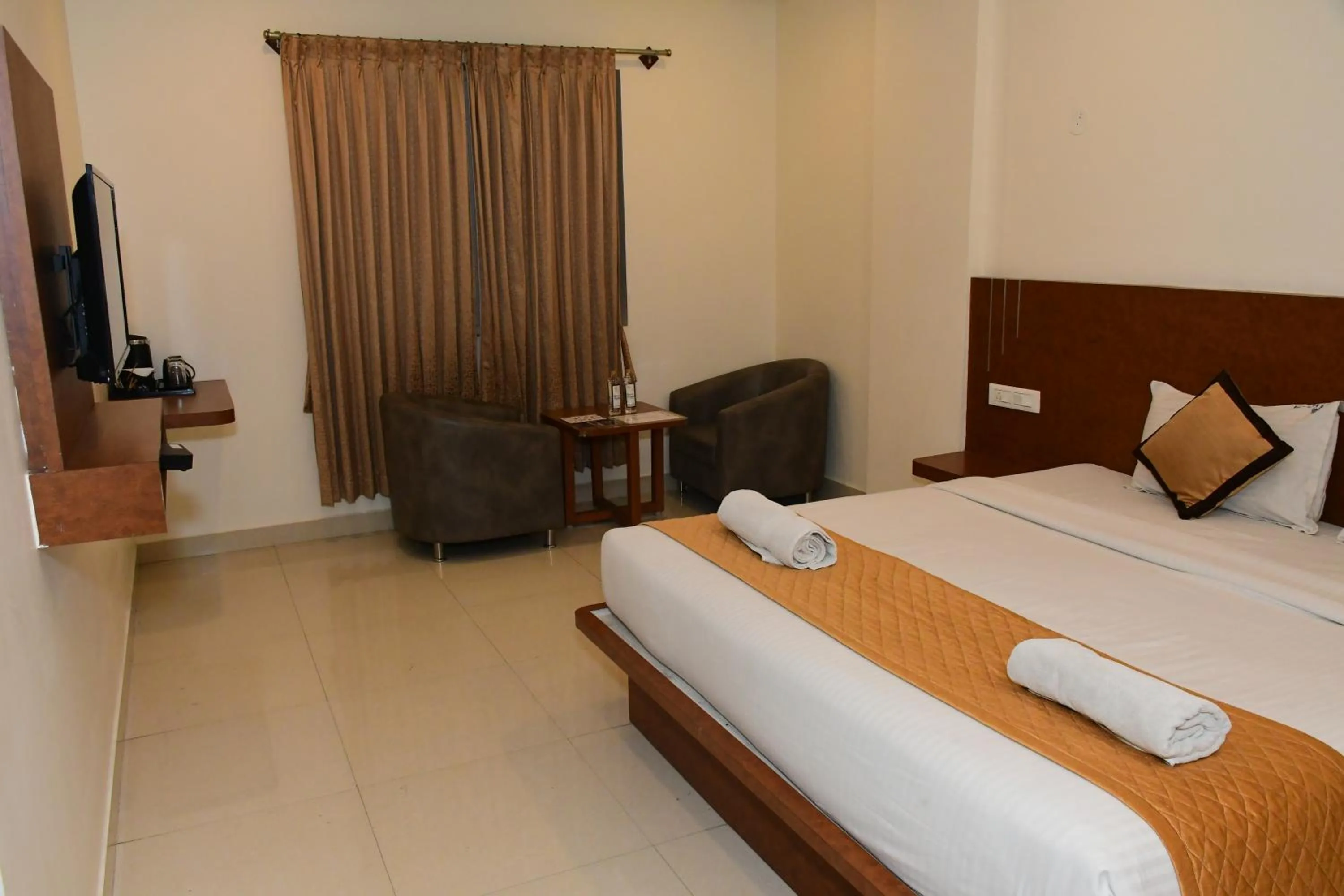 Bedroom, Bed in Sai Vihaar Inn & Suites