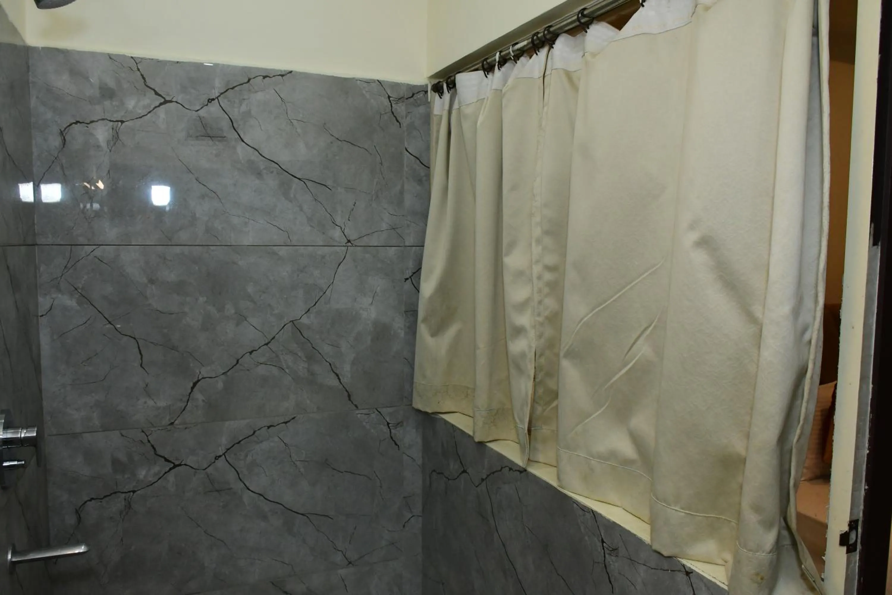 Bathroom in Sai Vihaar Inn & Suites