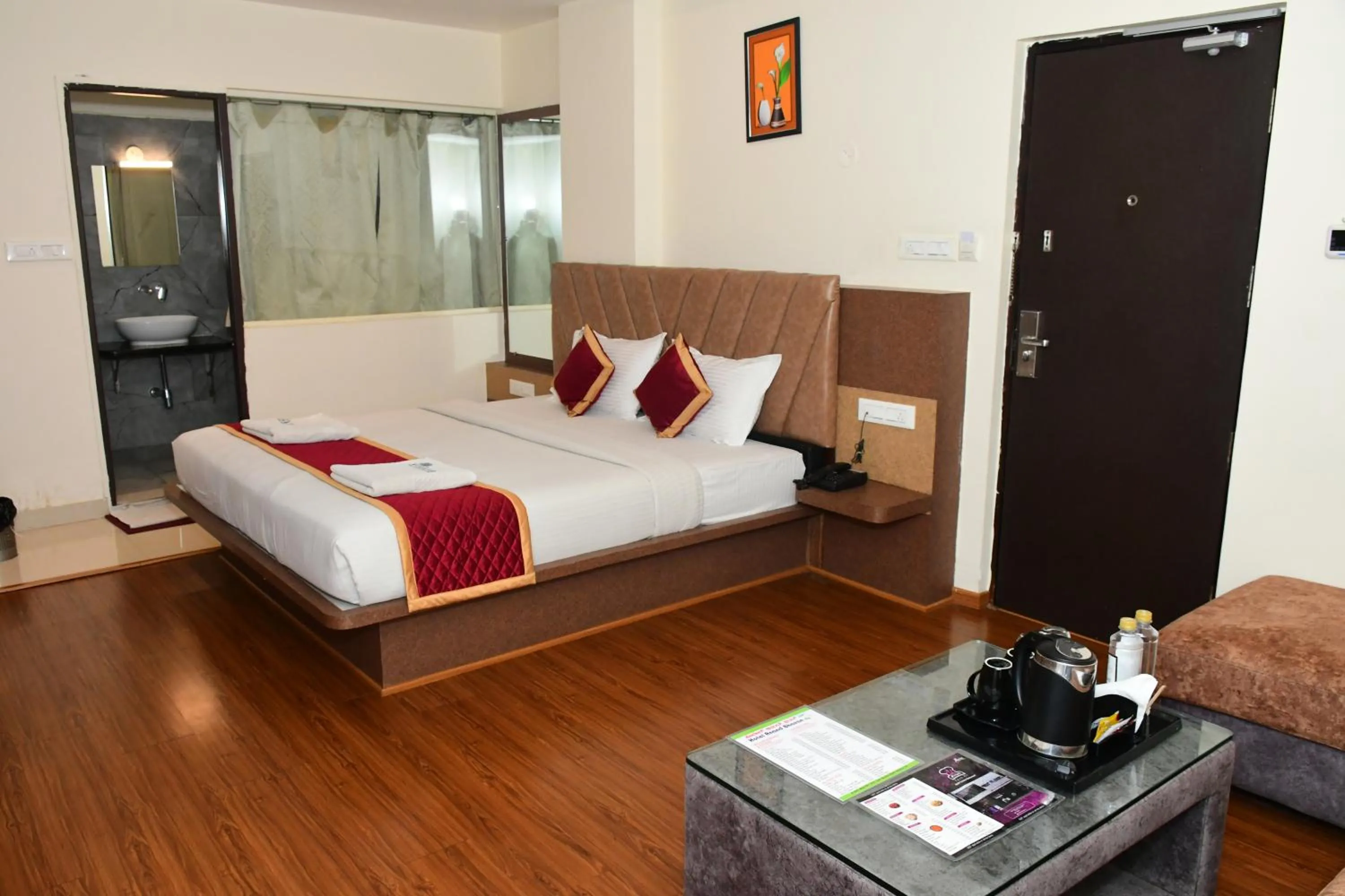 Photo of the whole room, Bed in Sai Vihaar Inn & Suites