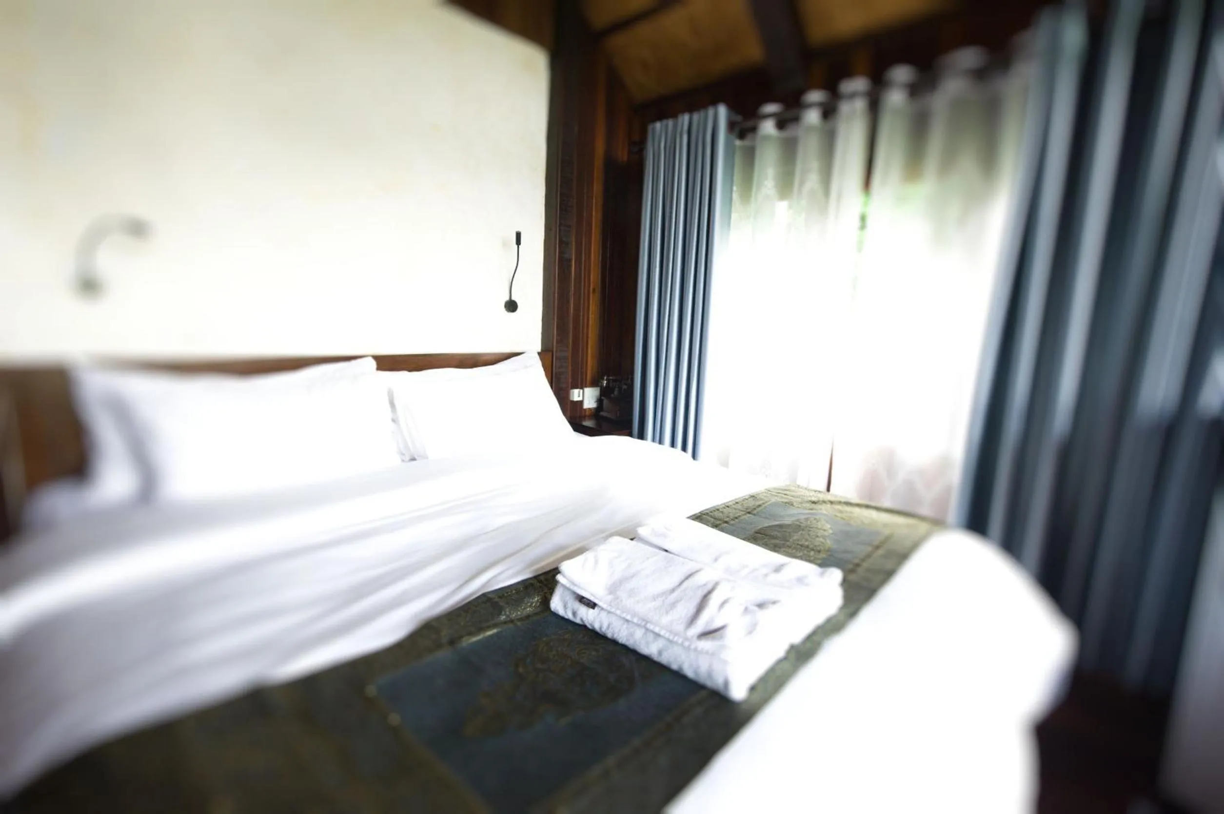 Bed in Kawarin Secret Hut Hotel and Resort