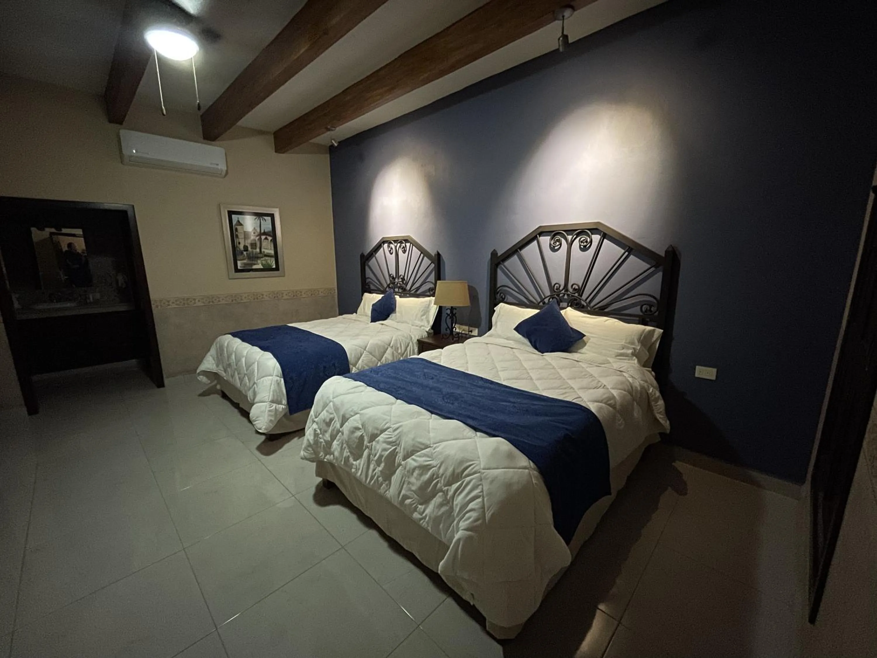 Bed in Hotel Real de los Alamos