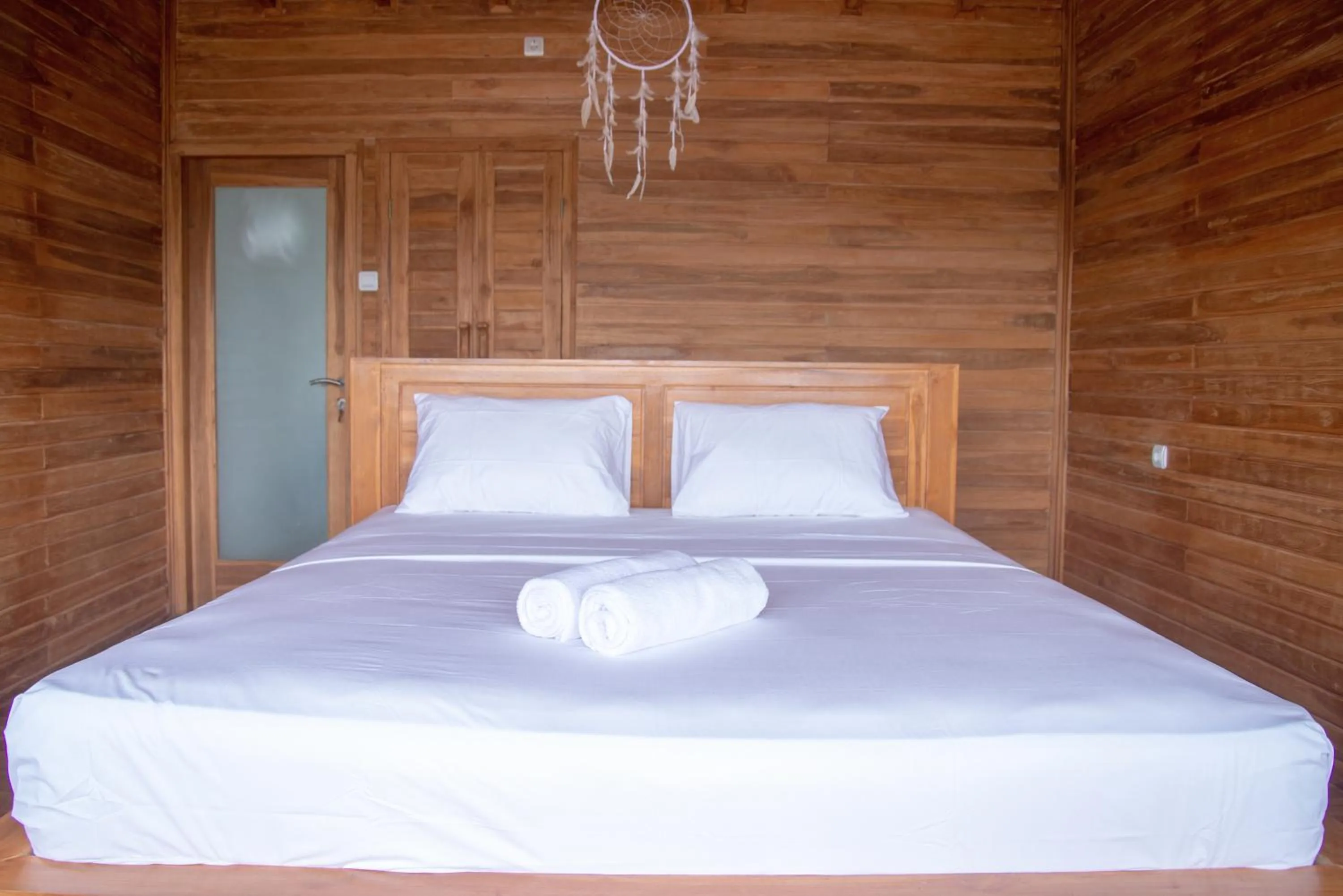 Bed in Butterfly Villas Nusa Ceningan
