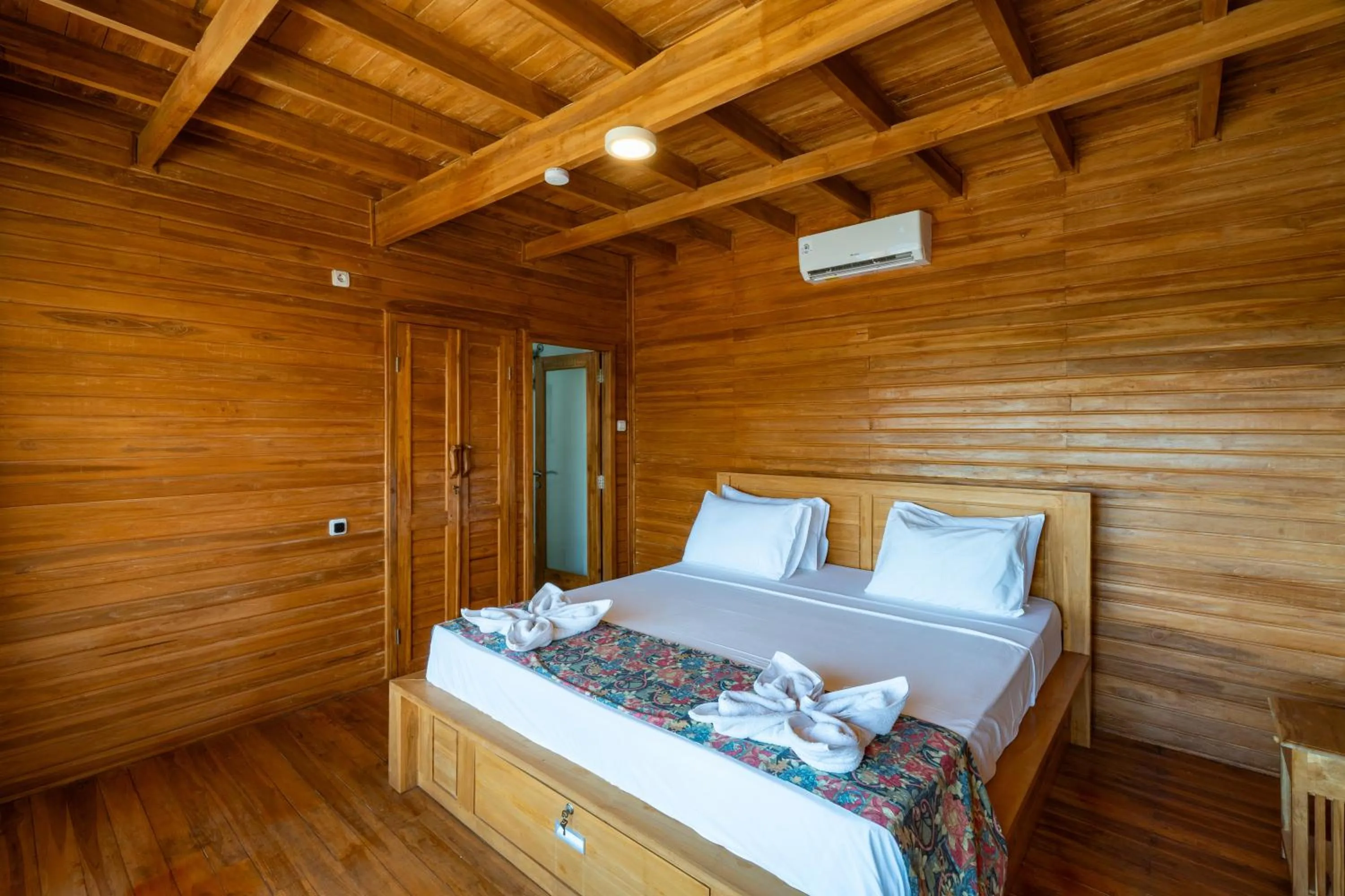 Bed in Butterfly Villas Nusa Ceningan